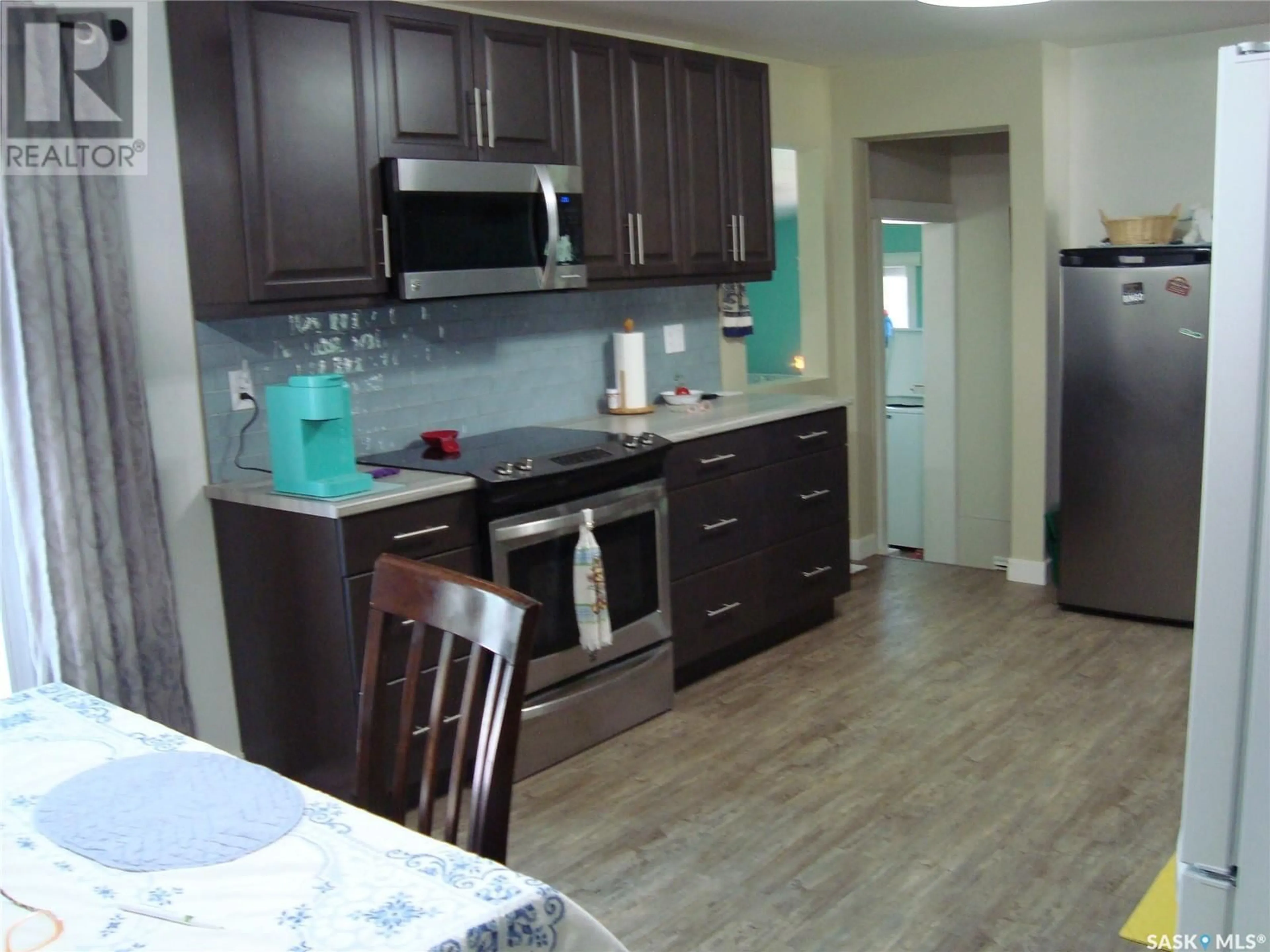 Open concept kitchen, unknown for 403 CENTRE STREET, Cabri Saskatchewan S0N0J0