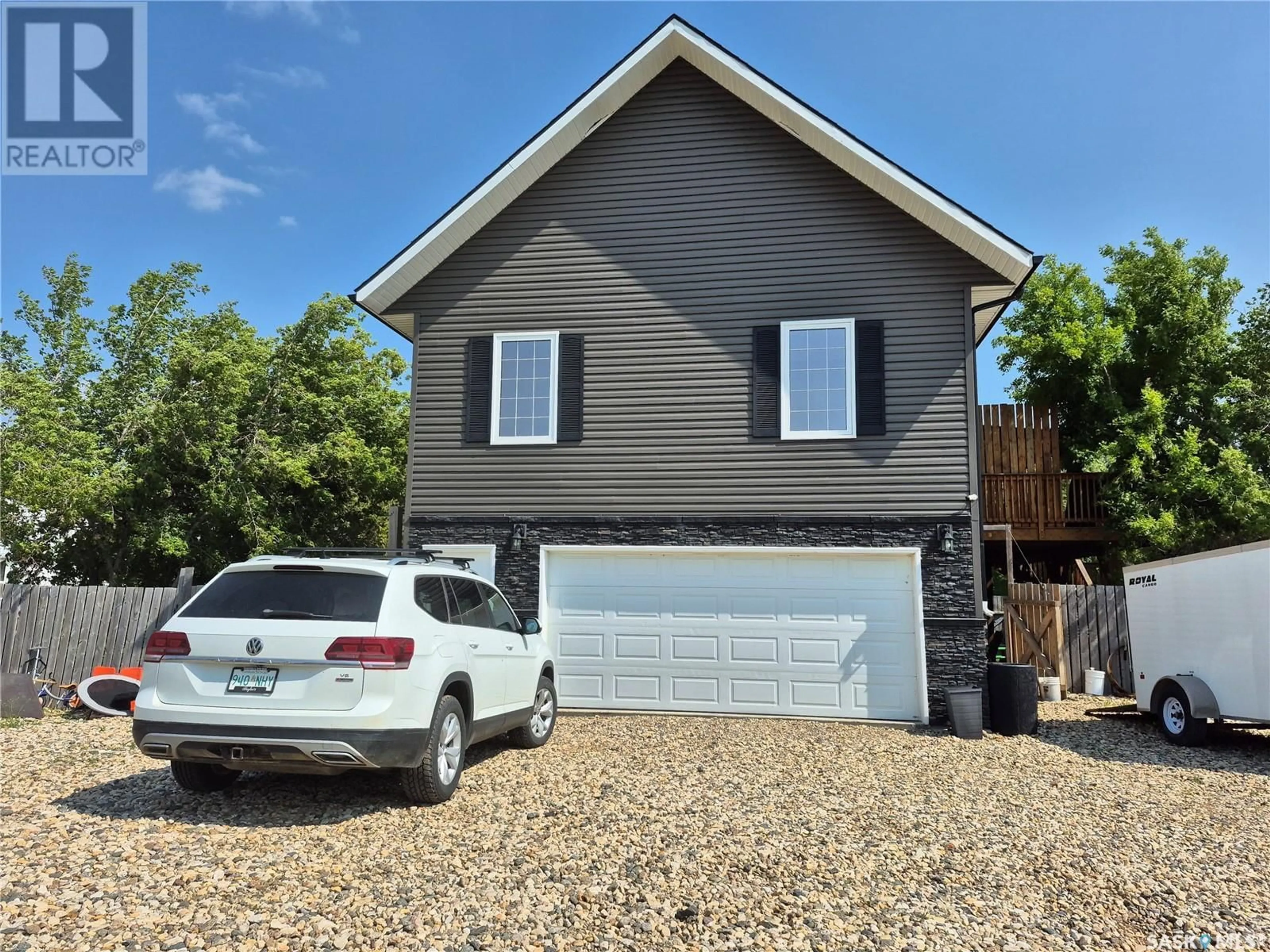 Home with vinyl exterior material, street for 302 MARTIN STREET, Pangman Saskatchewan S0C2C0