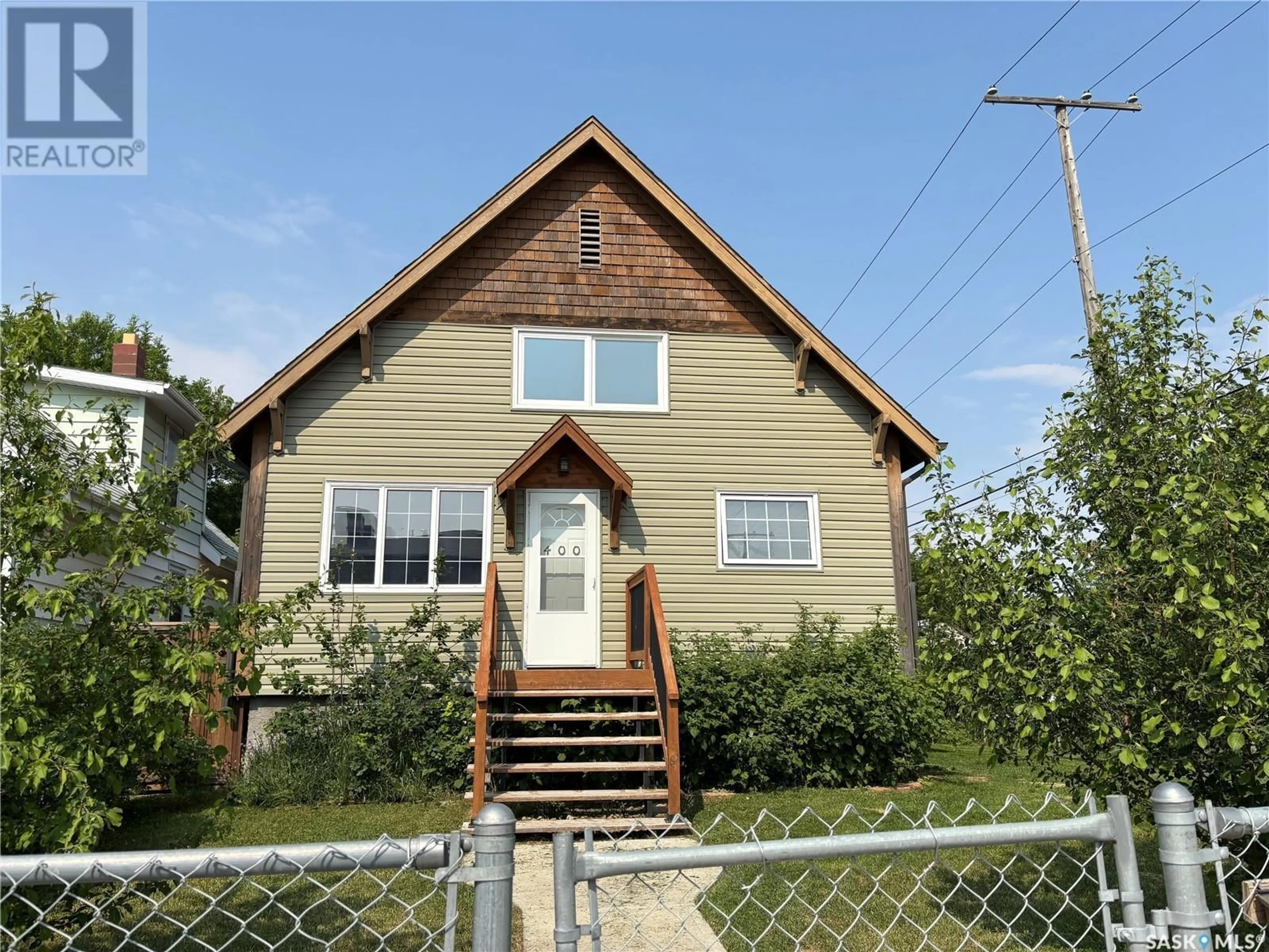 Home with vinyl exterior material, street for 400 TORONTO STREET, Regina Saskatchewan S4R1M4