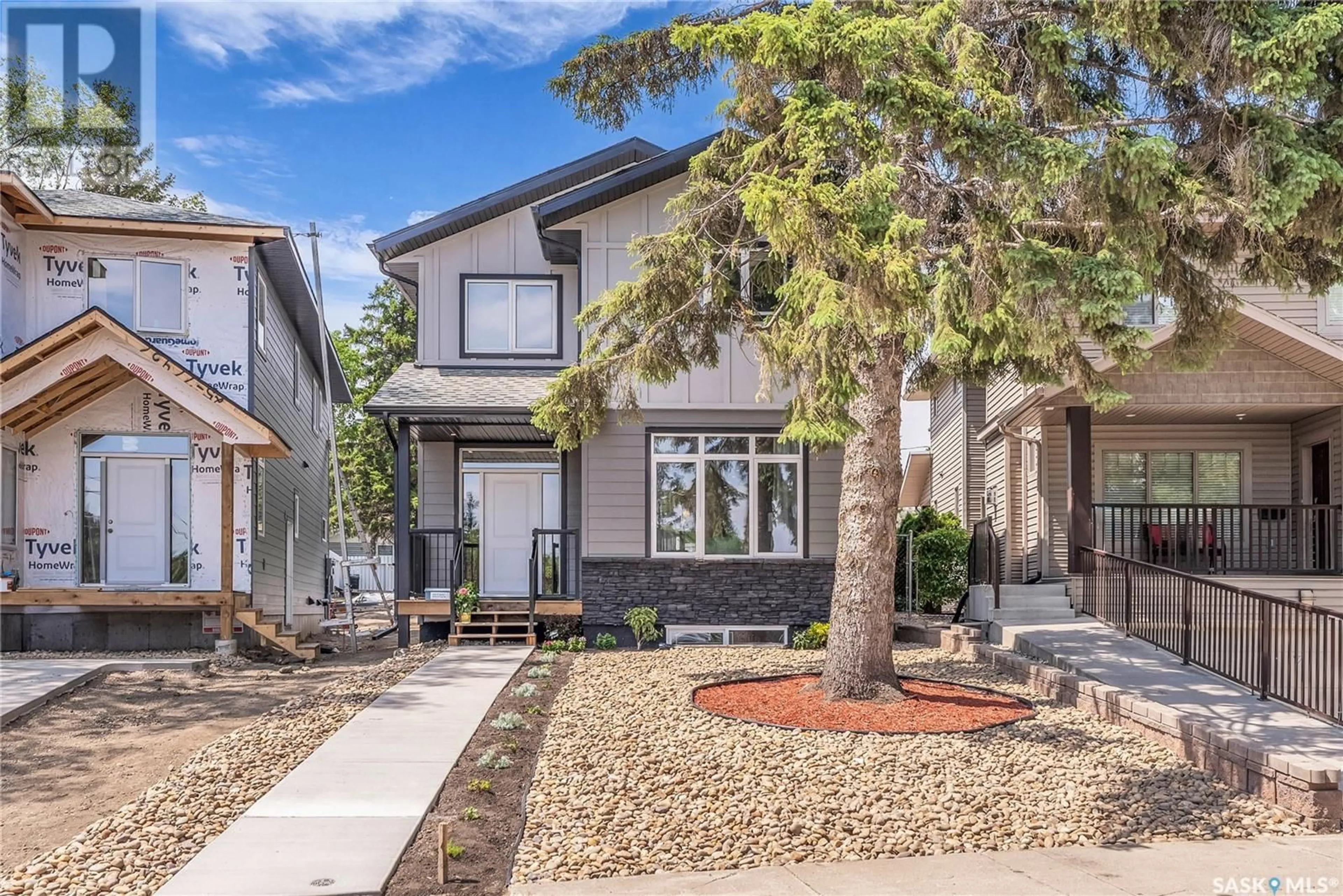 Home with brick exterior material, street for 1601b 9TH AVENUE, Saskatoon Saskatchewan S7K2Z9