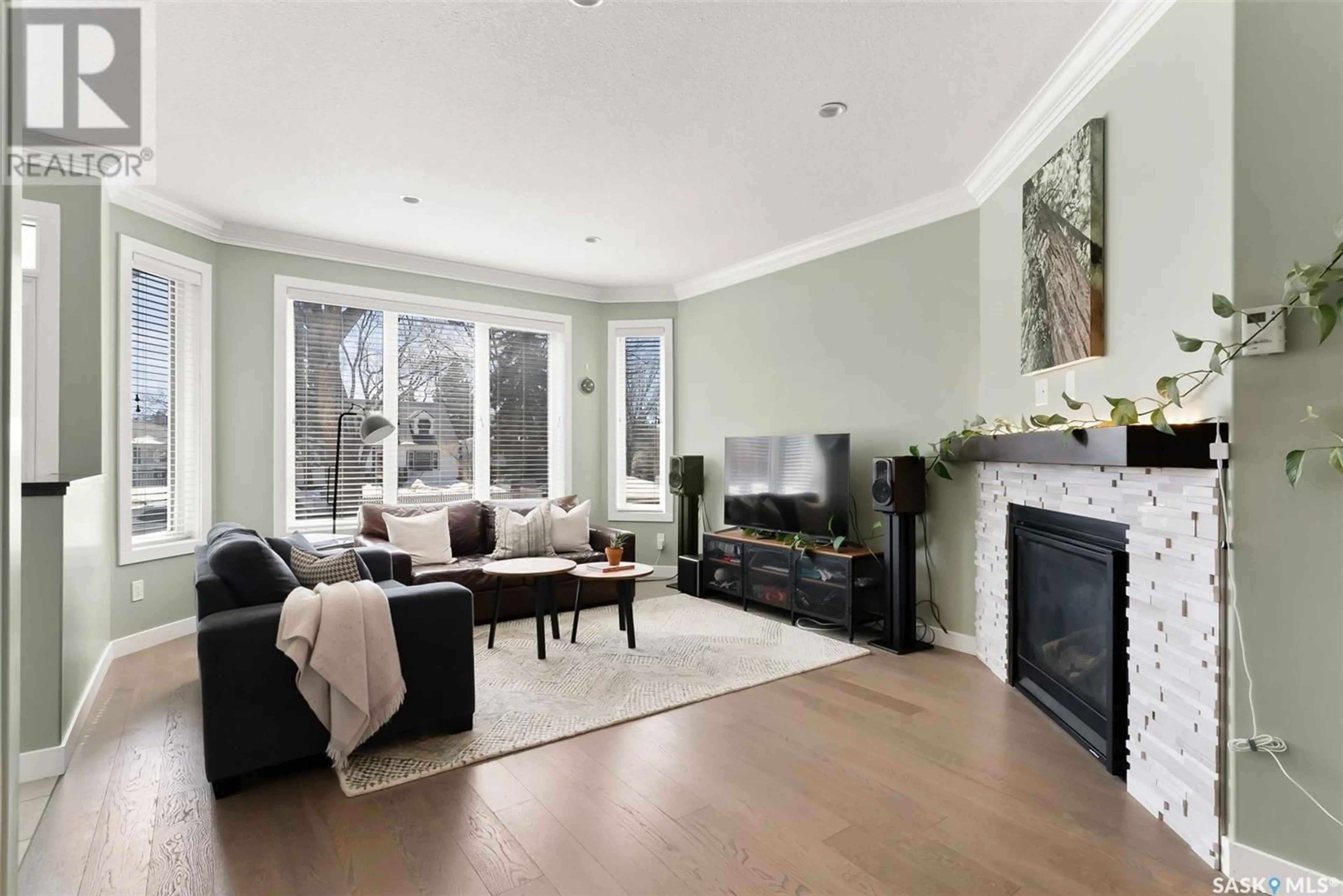 Living room with furniture, wood/laminate floor for 3124 HILL AVENUE, Regina Saskatchewan S4S0W3