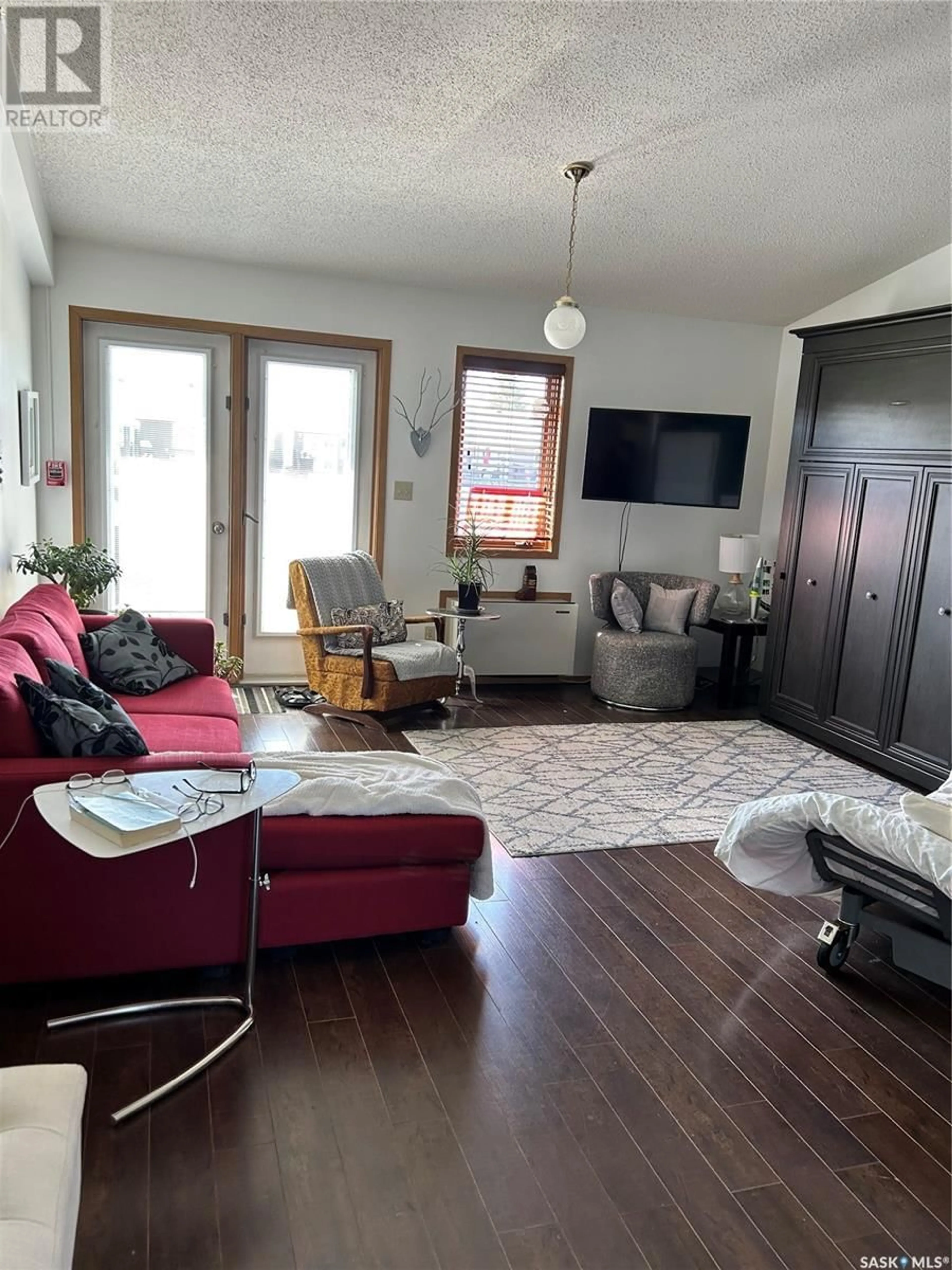 Living room with furniture, unknown for 15 1250 AARO AVENUE, Elbow Saskatchewan S0H1J0