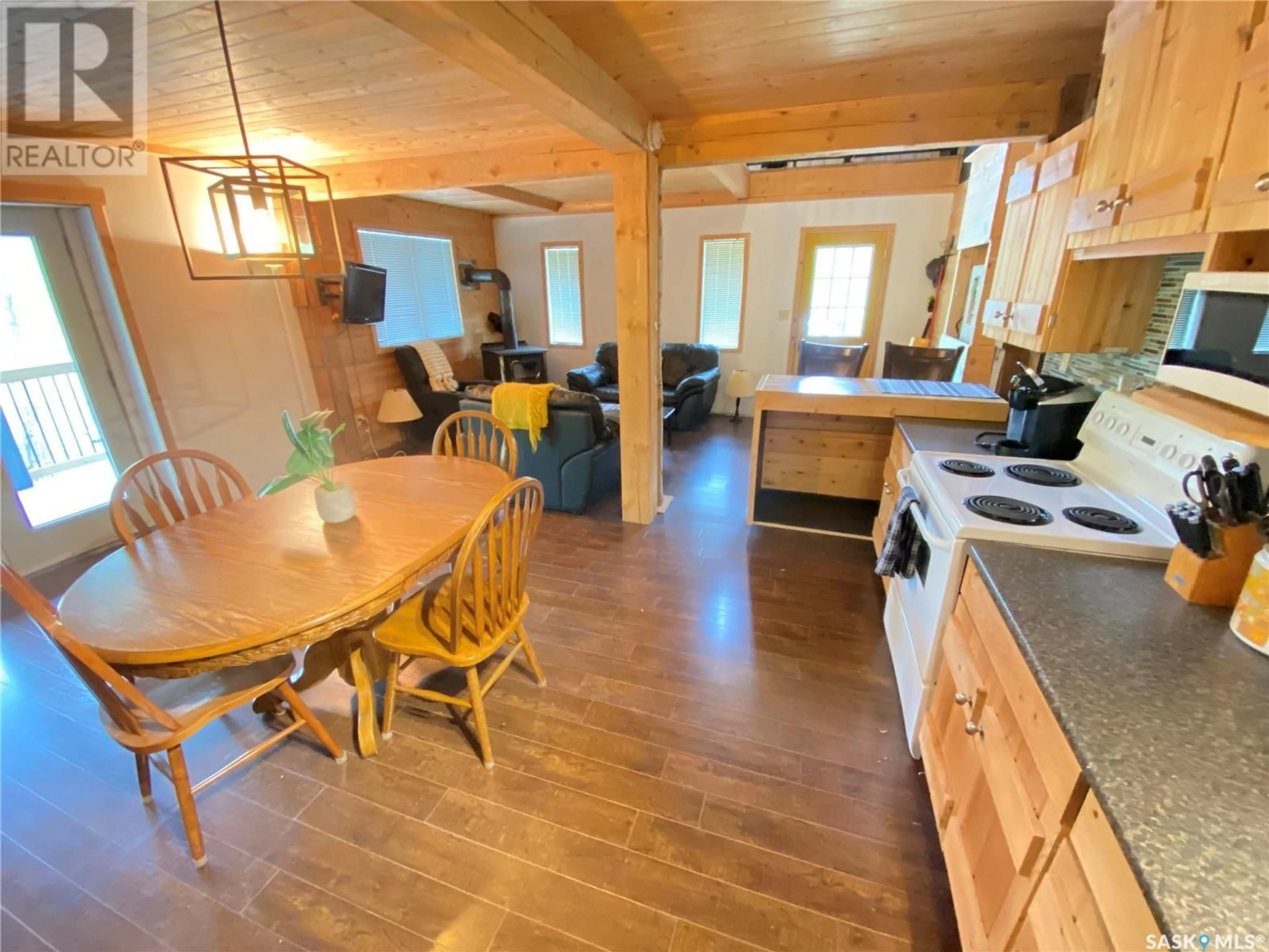 Open concept kitchen, wood/laminate floor for 201 GOVERNMENT ROAD, Good Spirit Lake Saskatchewan S0A1G0