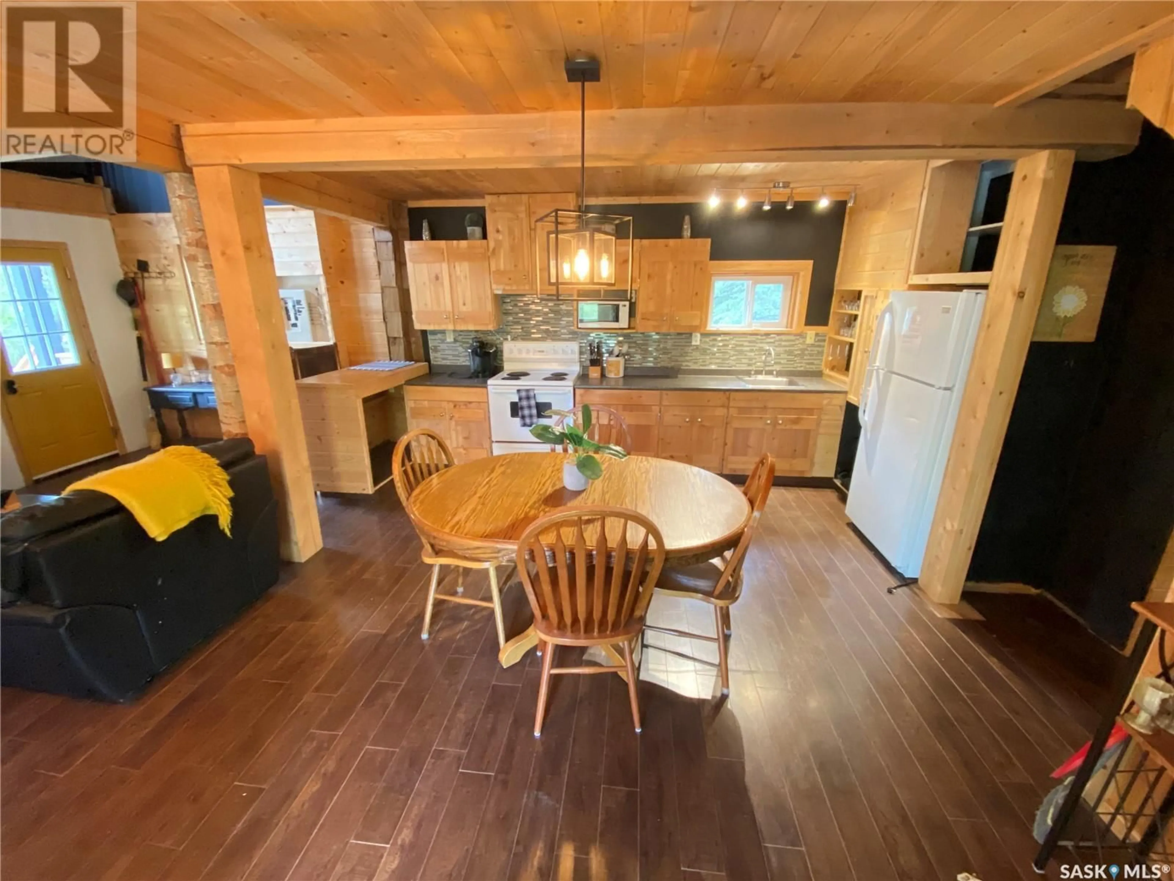 Open concept kitchen, wood/laminate floor for 201 GOVERNMENT ROAD, Good Spirit Lake Saskatchewan S0A1G0