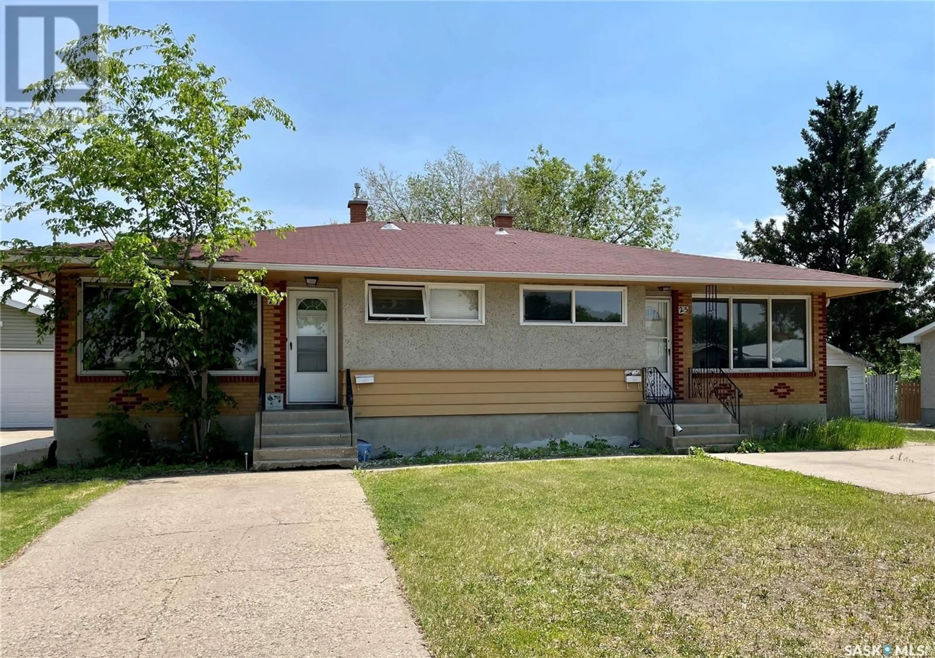 Home with vinyl exterior material, street for 25 - 27 CUSHING CRESCENT, Regina Saskatchewan S4N1V2