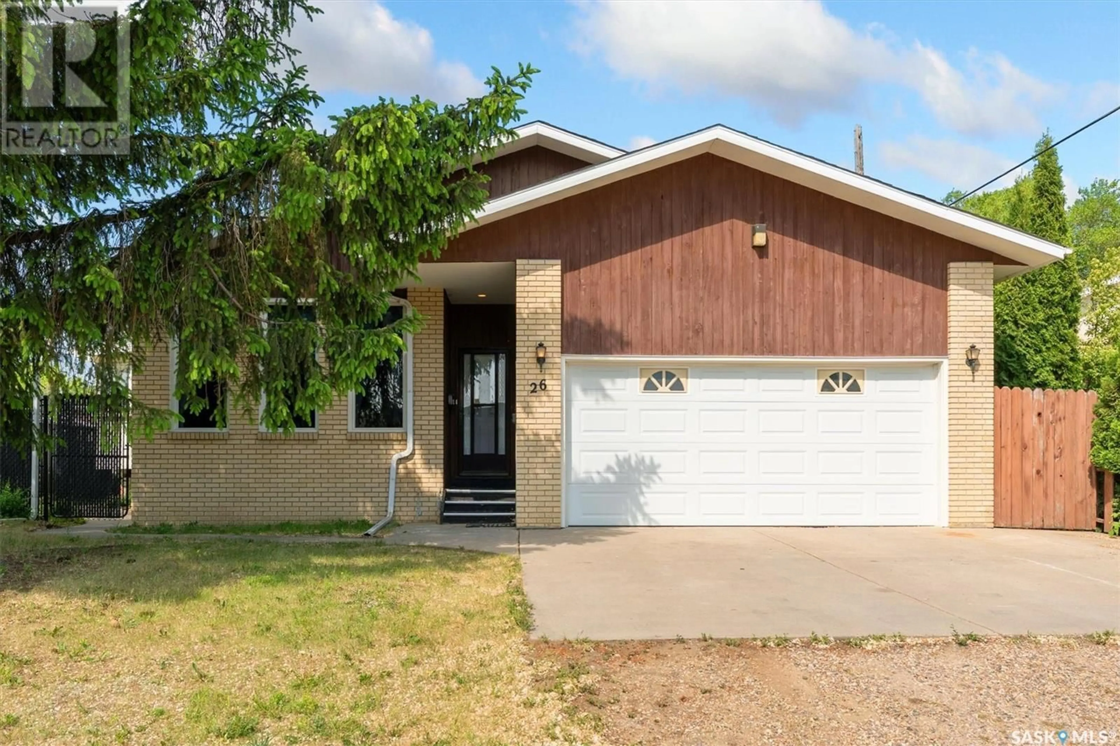 Home with vinyl exterior material, street for 26 4TH AVENUE, Martensville Saskatchewan S0K2T0