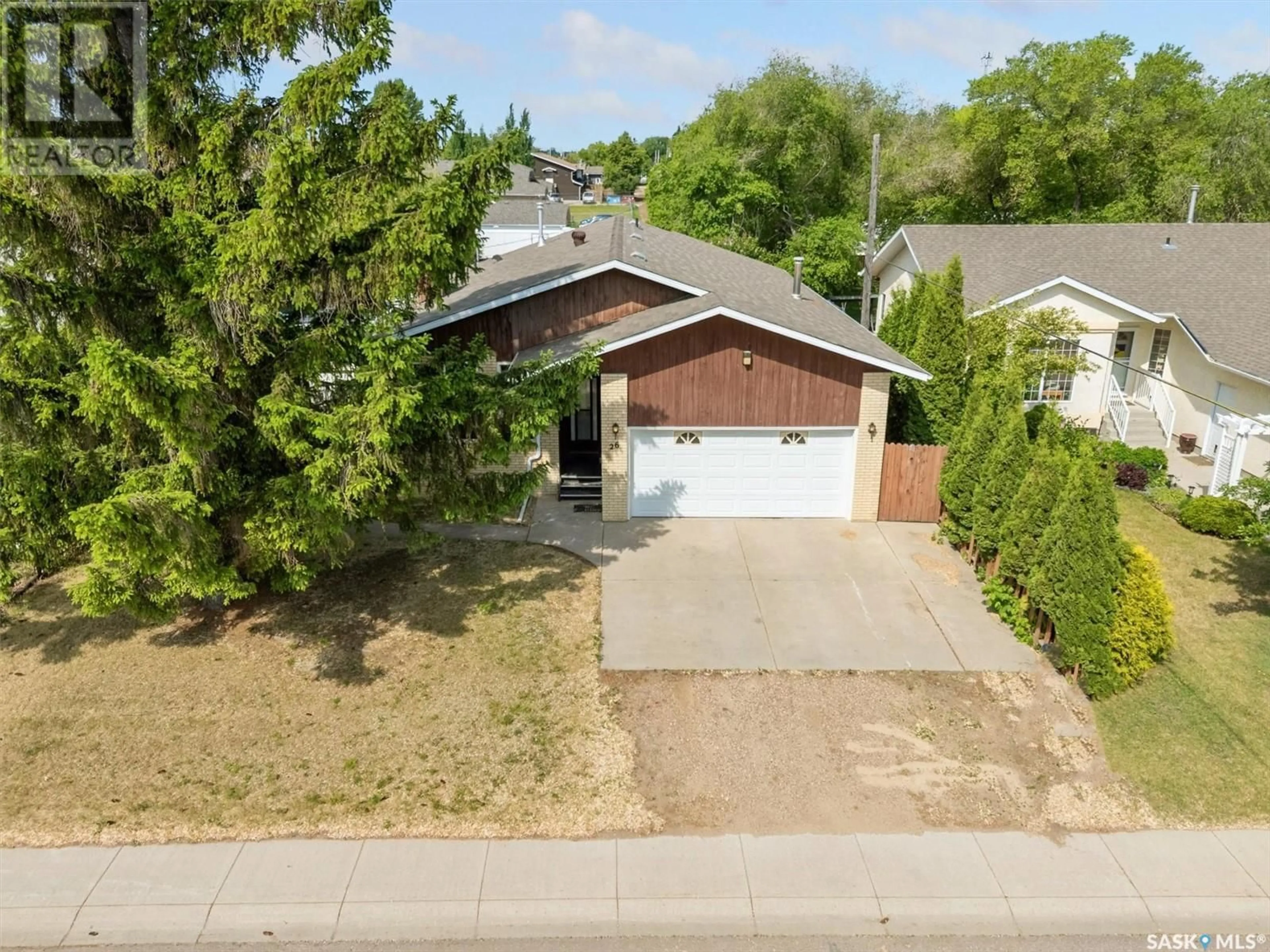 A pic from outside/outdoor area/front of a property/back of a property/a pic from drone, street for 26 4TH AVENUE, Martensville Saskatchewan S0K2T0