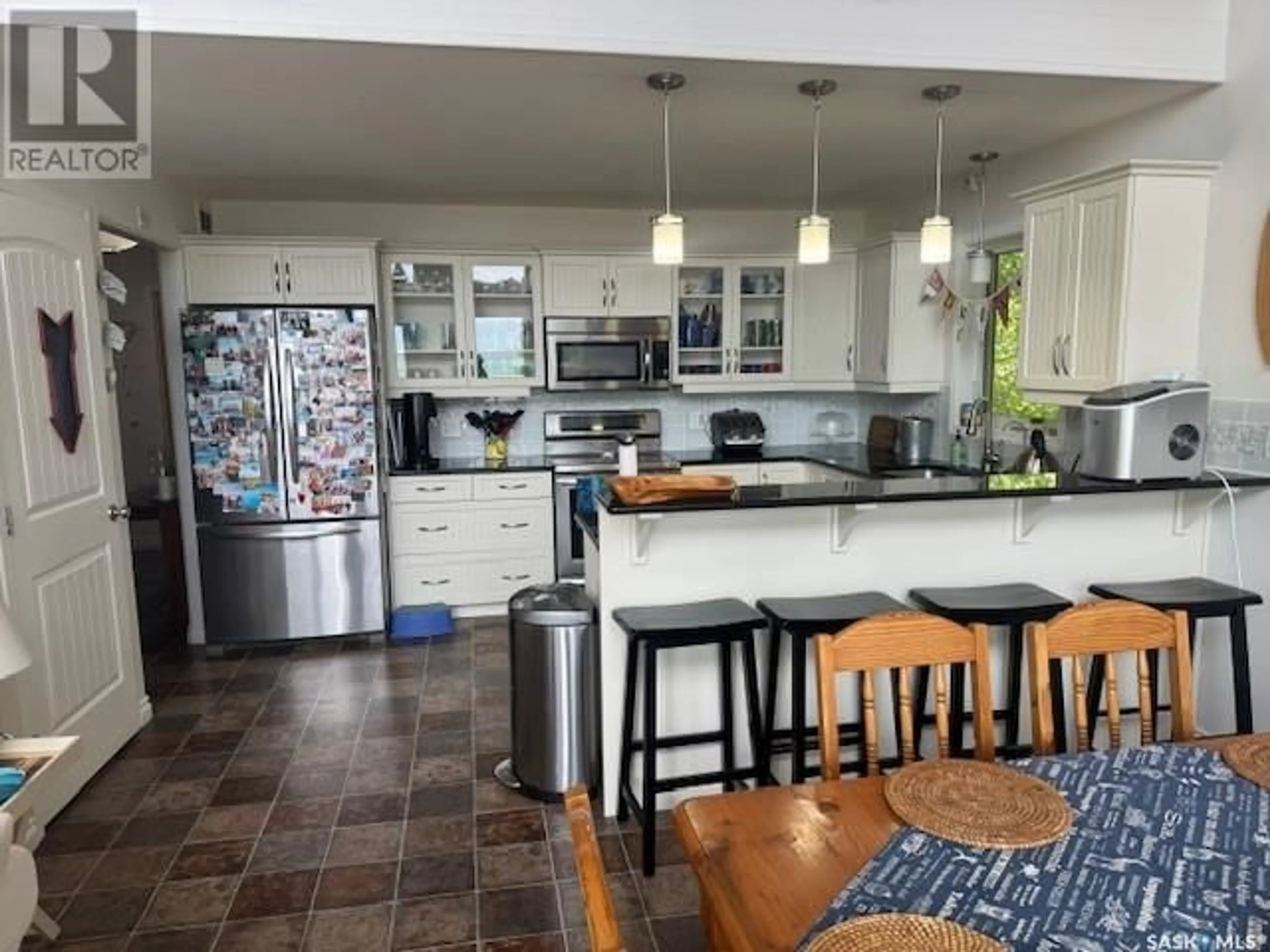 Open concept kitchen, ceramic/tile floor for 307 LAKEVIEW AVENUE, Meota Saskatchewan S0M1X0