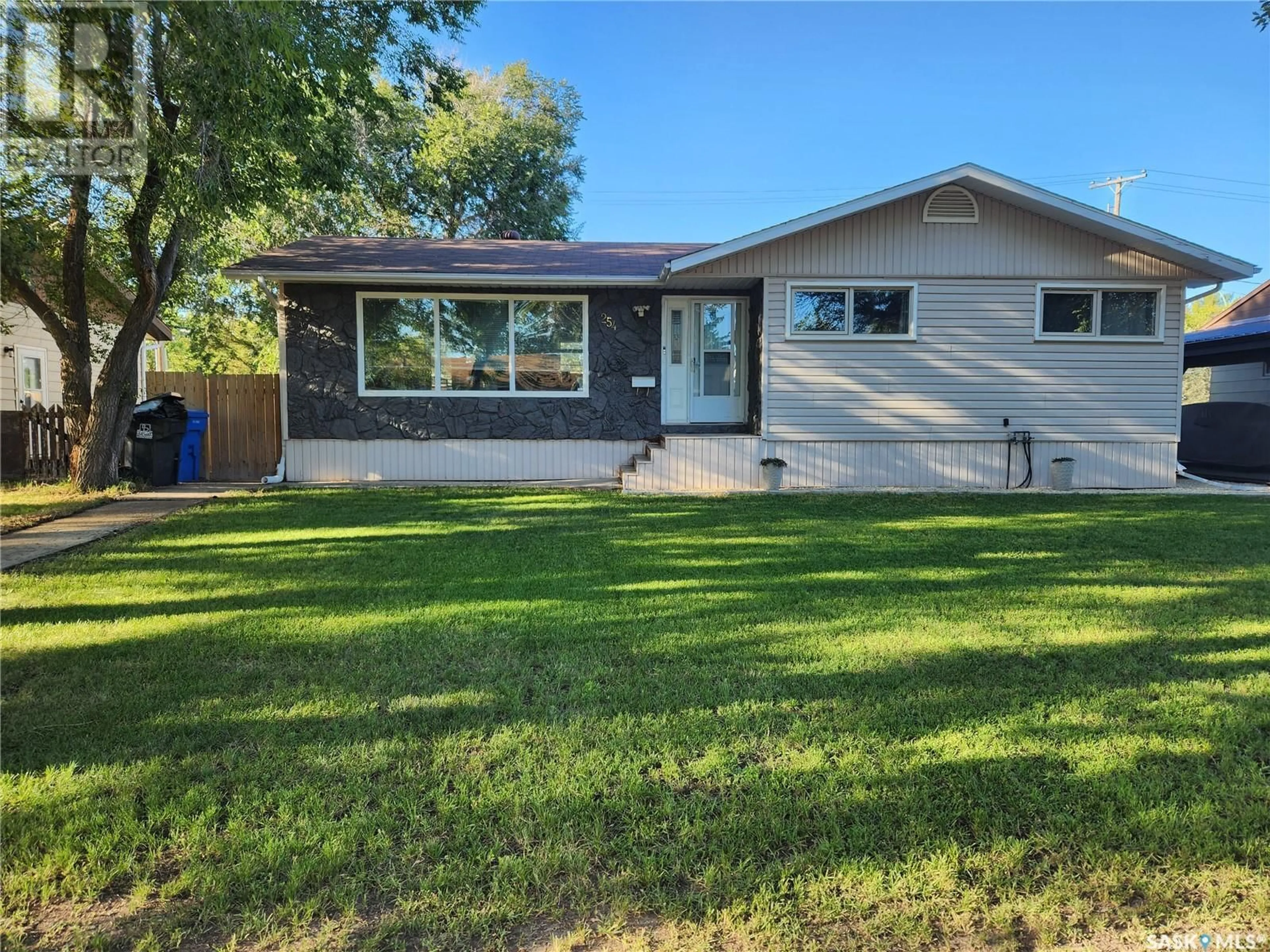 Home with vinyl exterior material, street for 254 DUNCAN ROAD, Estevan Saskatchewan S4A0A4