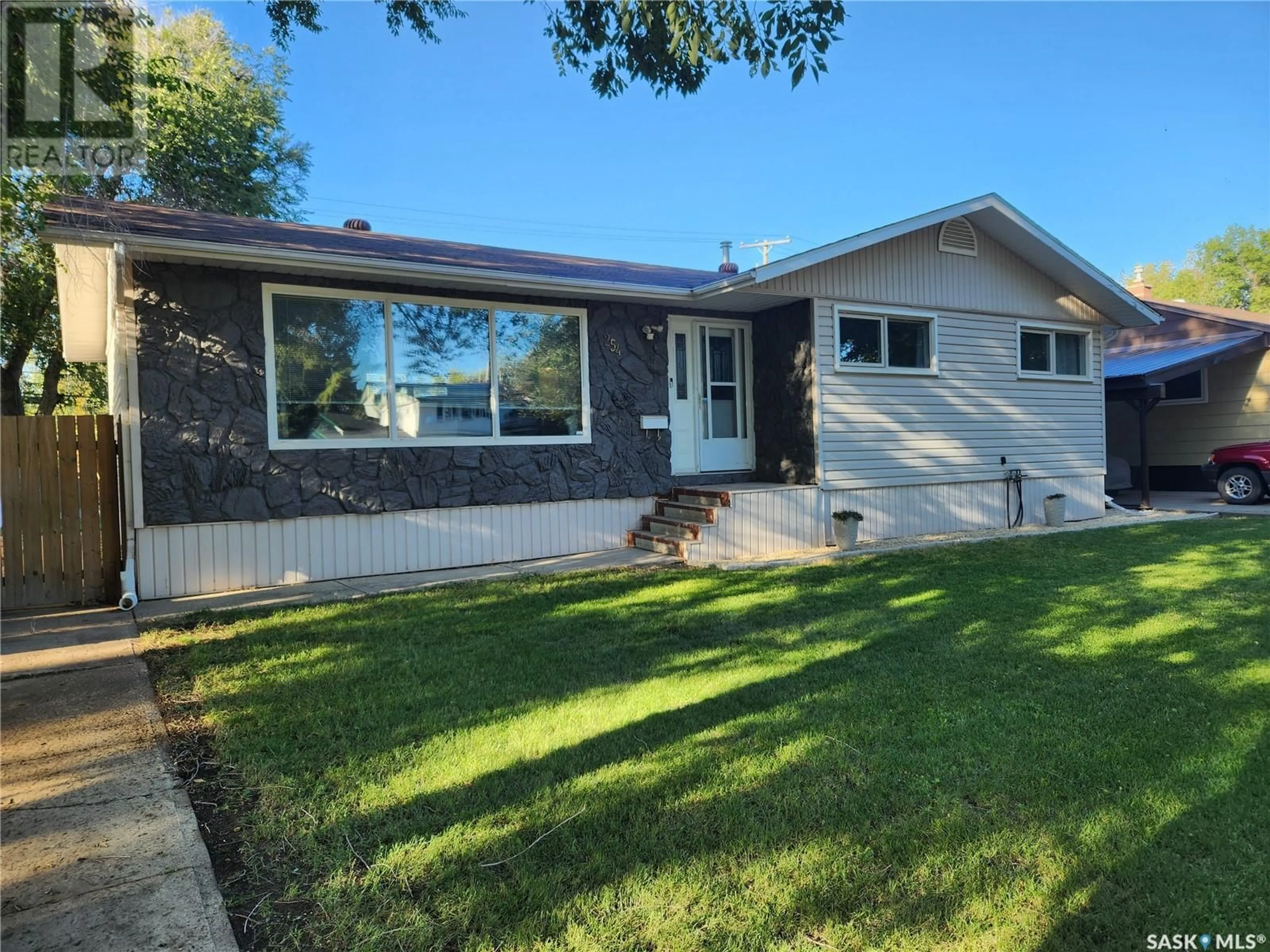 Home with vinyl exterior material, street for 254 DUNCAN ROAD, Estevan Saskatchewan S4A0A4