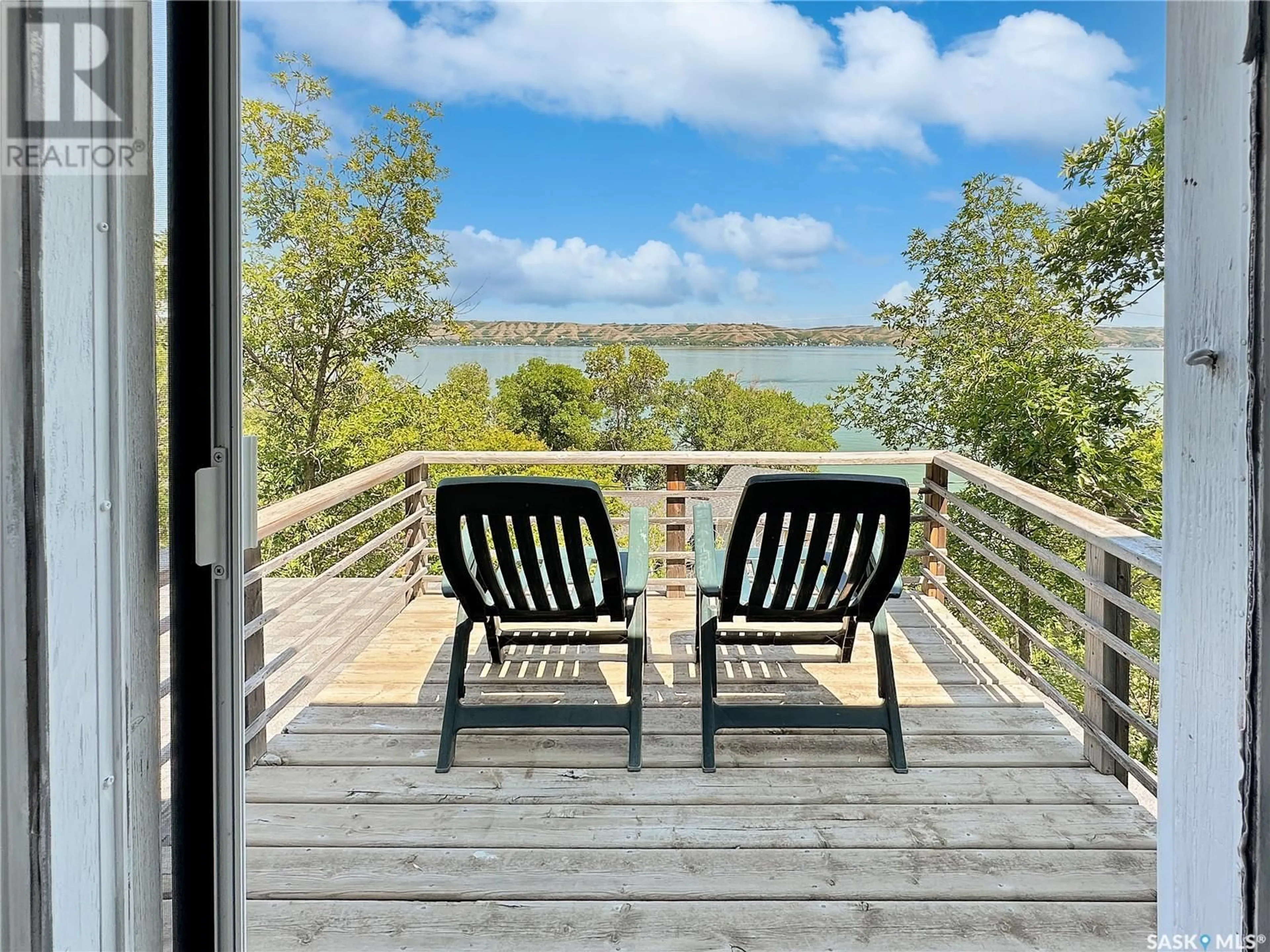 Patio, water/lake/river/ocean view for 119 B-SAY-TAH ROAD, B-Say-Tah Saskatchewan S0G1S0