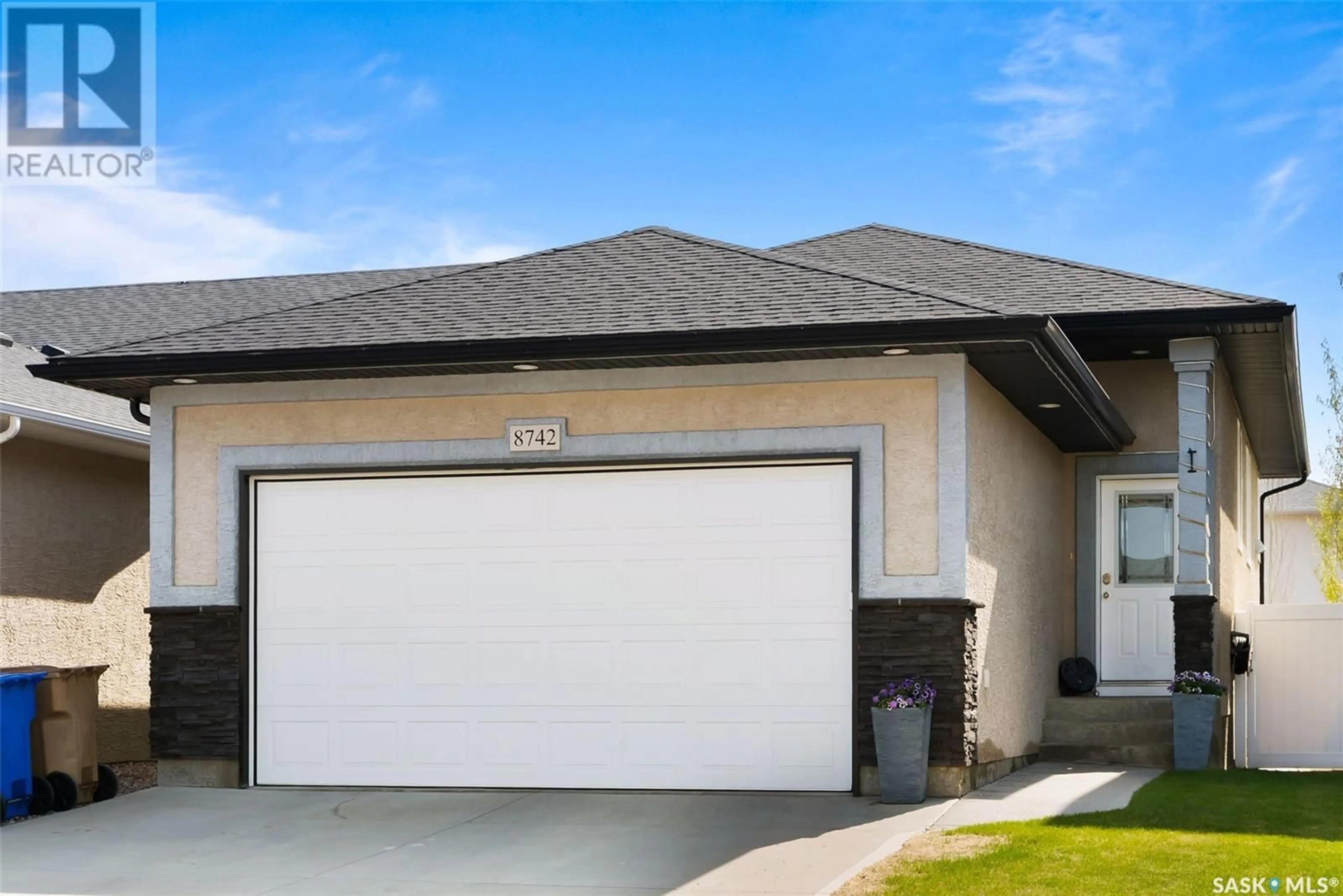 Home with vinyl exterior material, street for 8742 HERMAN CRESCENT, Regina Saskatchewan S4Y0B9