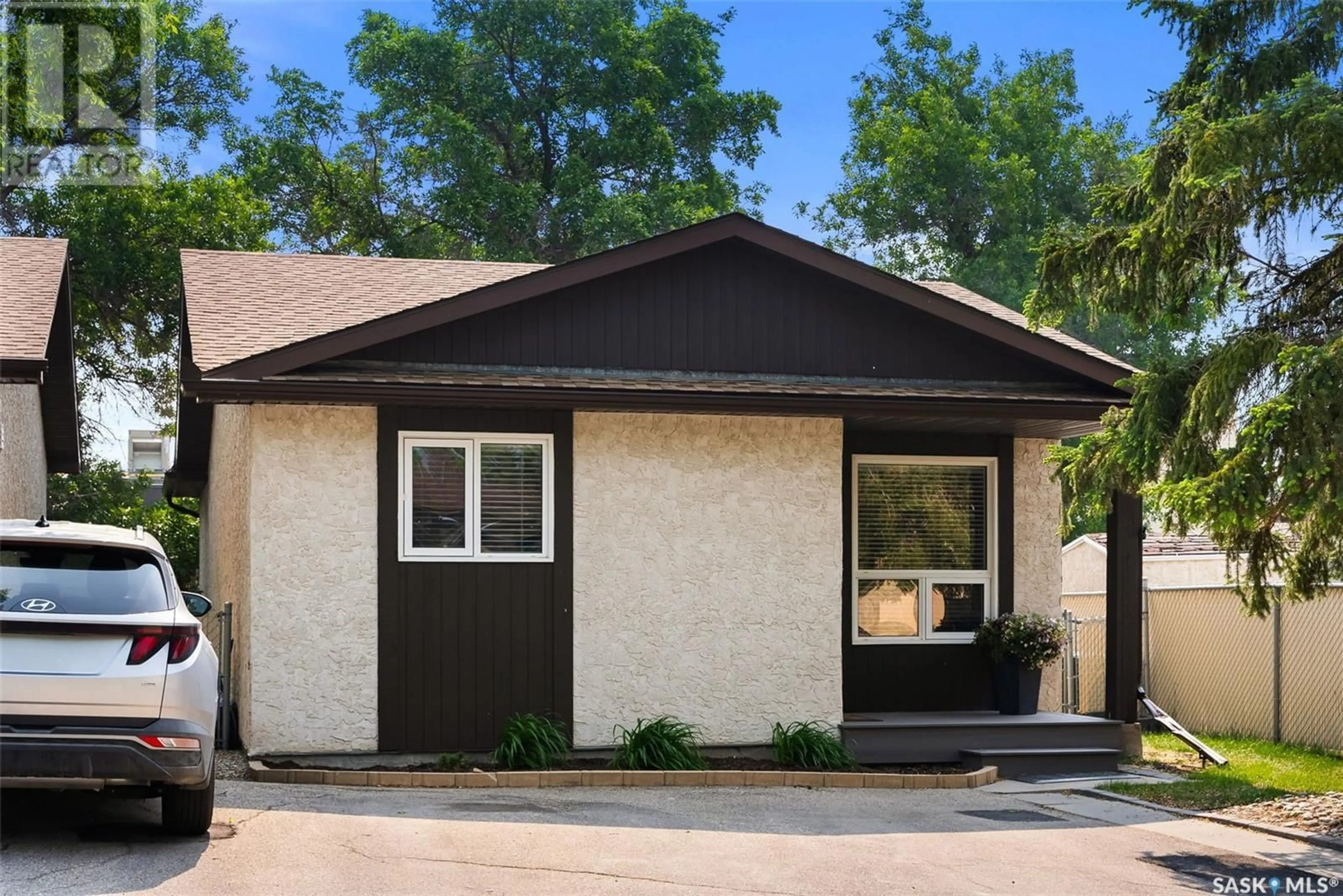 Home with vinyl exterior material, street for 2756 MEADOW LANE, Regina Saskatchewan S4V1L6