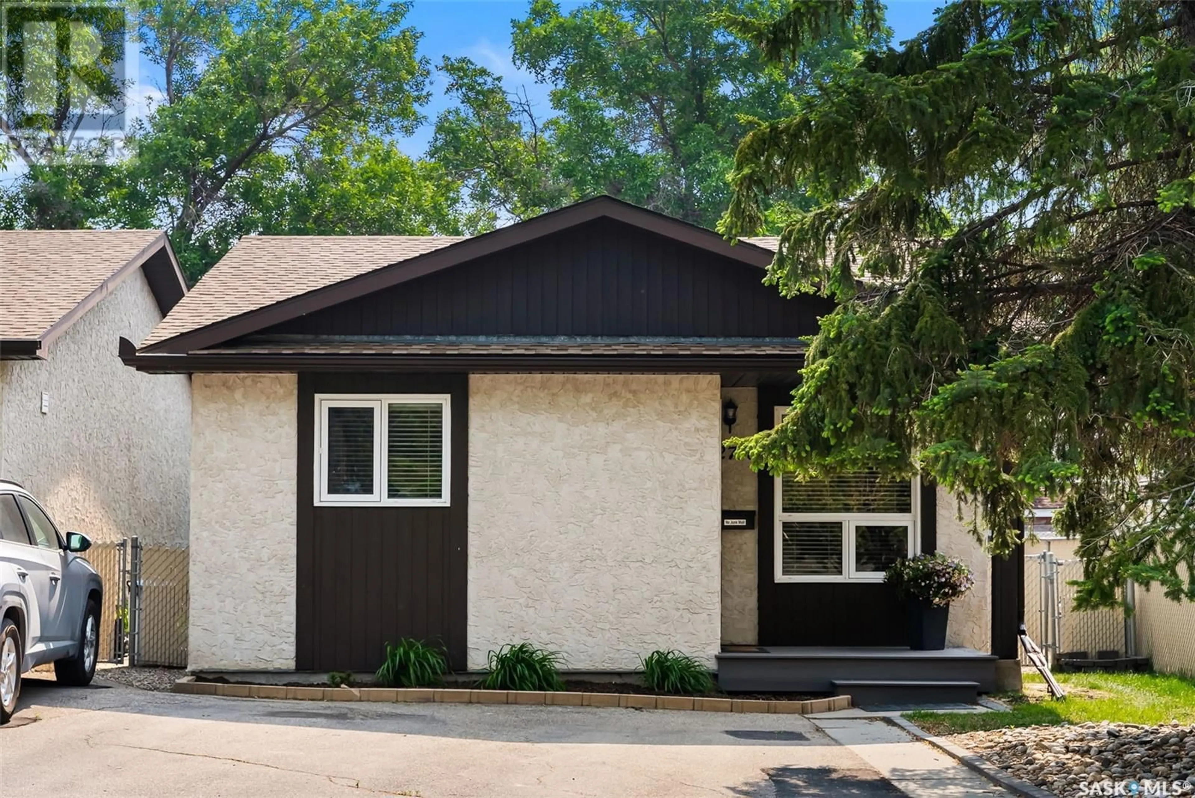 Home with vinyl exterior material, street for 2756 MEADOW LANE, Regina Saskatchewan S4V1L6