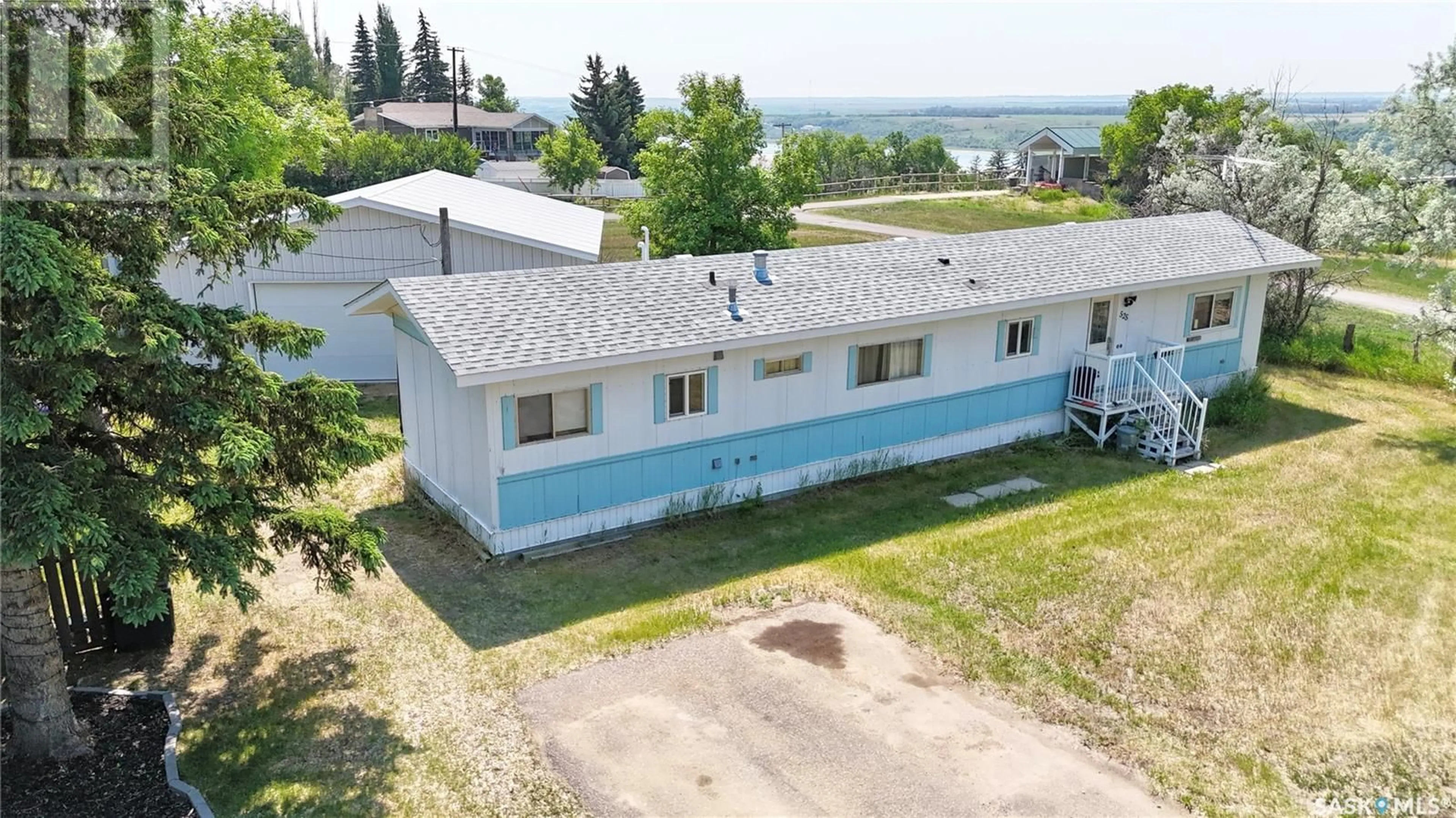 A pic from outside/outdoor area/front of a property/back of a property/a pic from drone, building for 525 PARK AVENUE, Outlook Saskatchewan S0L2N0