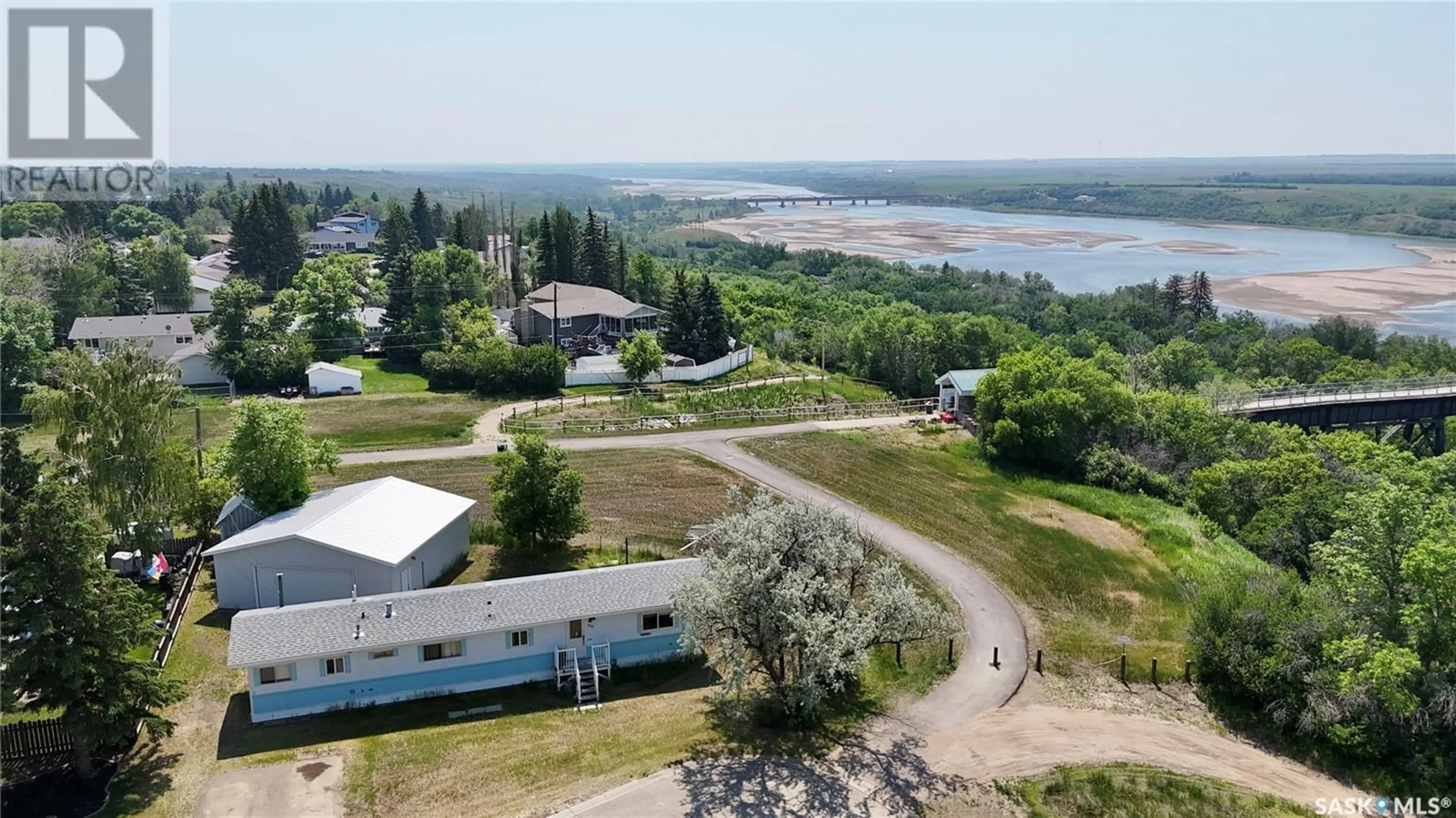 A pic from outside/outdoor area/front of a property/back of a property/a pic from drone, water/lake/river/ocean view for 525 PARK AVENUE, Outlook Saskatchewan S0L2N0