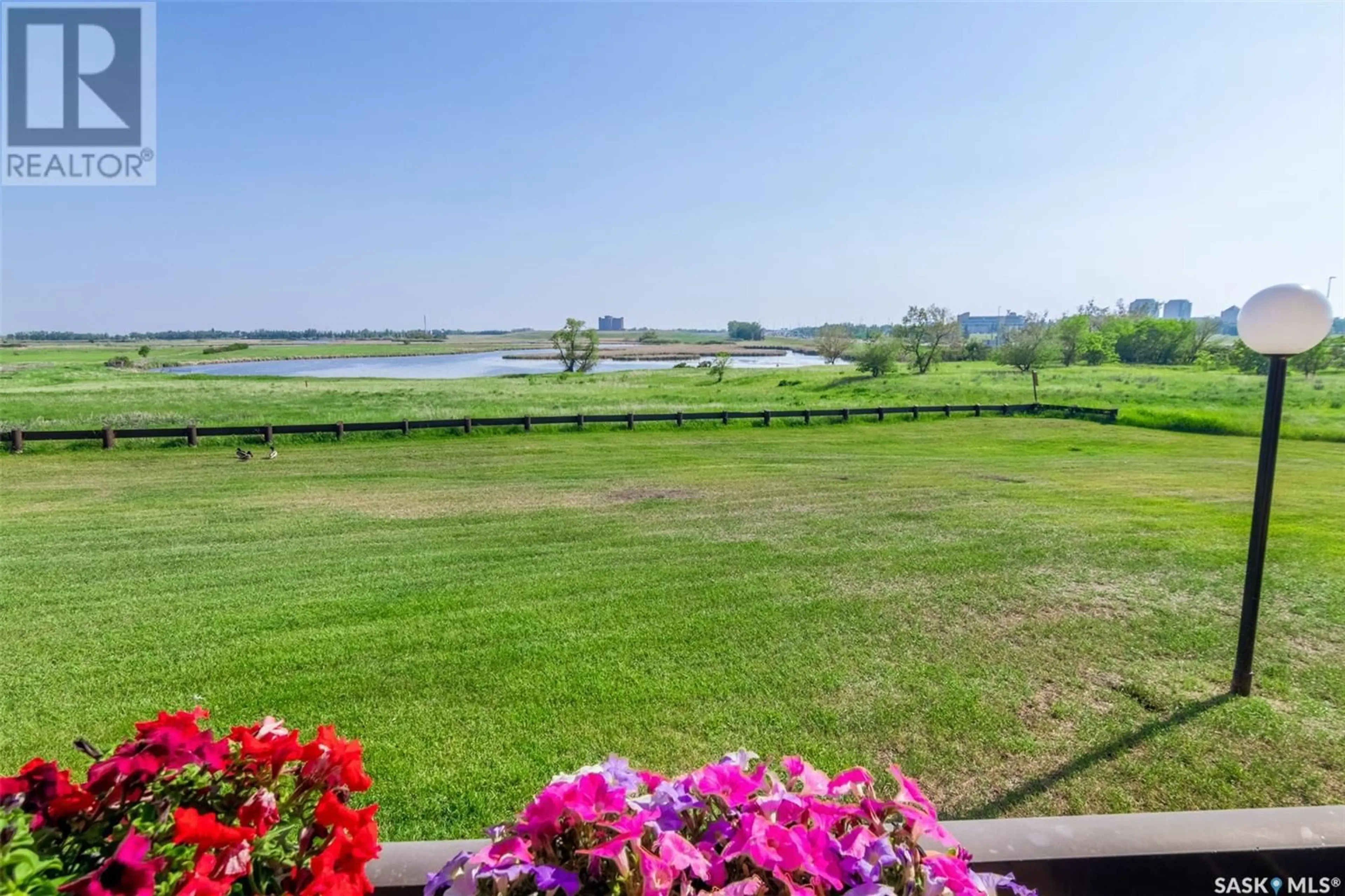 Patio, water/lake/river/ocean view for 113 - 3420 PARK STREET, Regina Saskatchewan S4V2M9