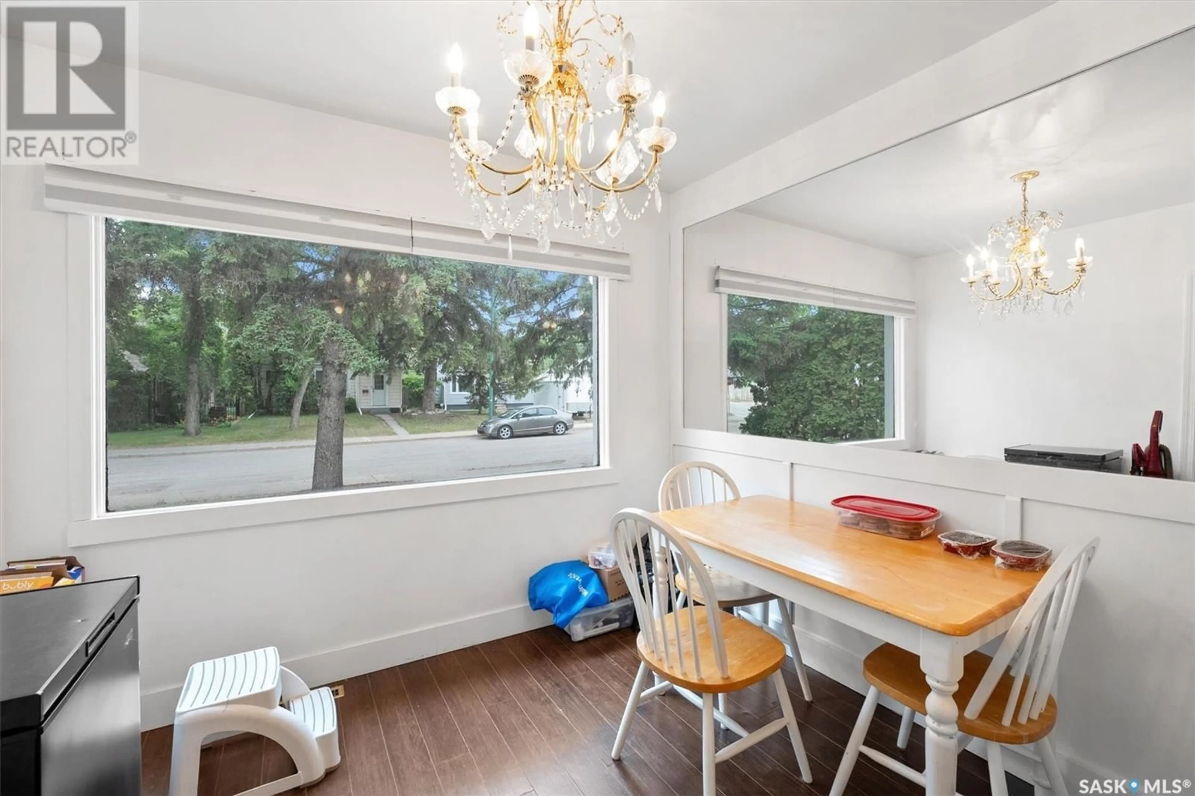 Dining room, wood/laminate floor for 1004 6TH STREET, Saskatoon Saskatchewan S7H1E2