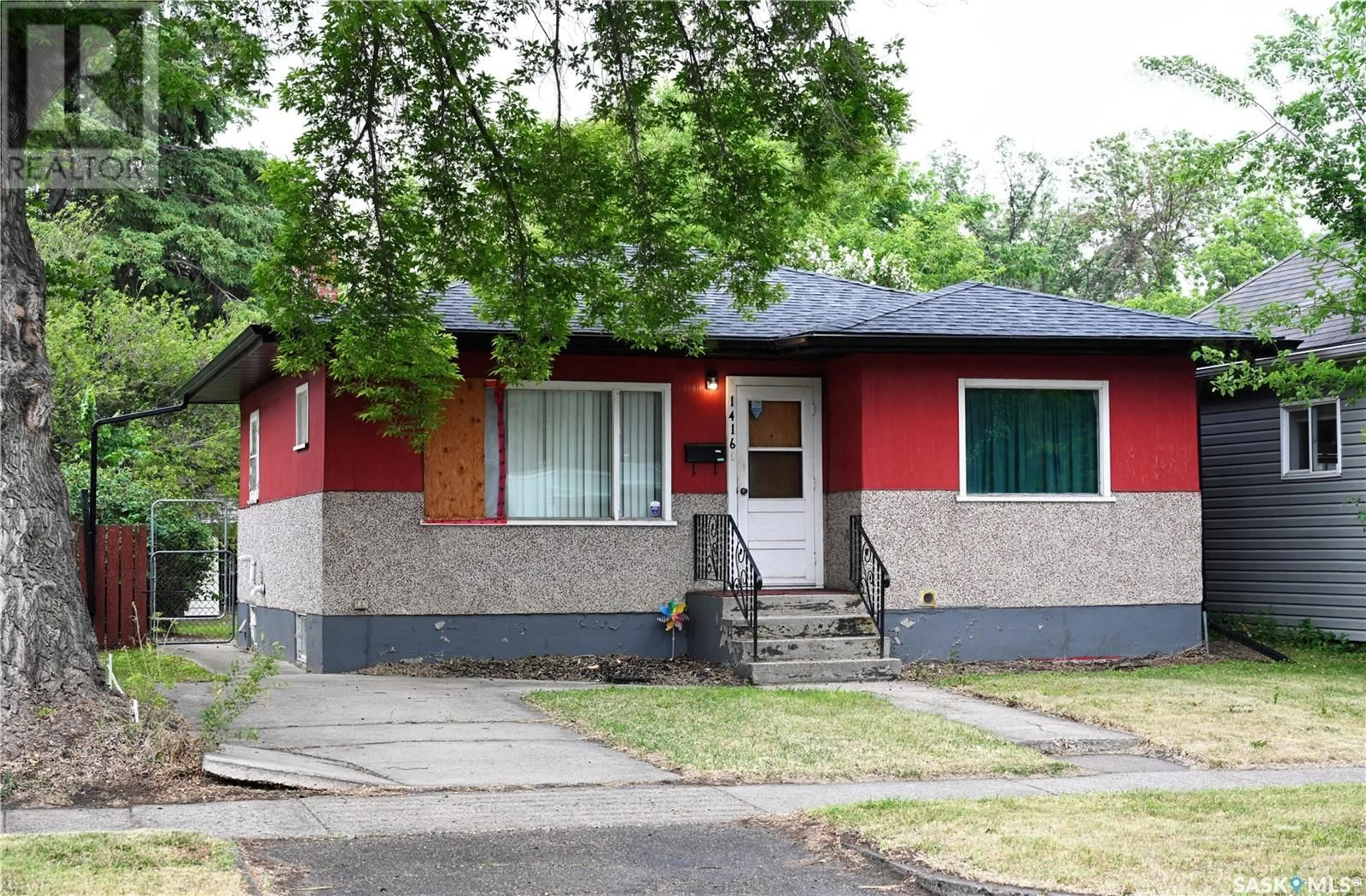 Home with vinyl exterior material, street for 1416 D AVENUE, Saskatoon Saskatchewan S7L1P4