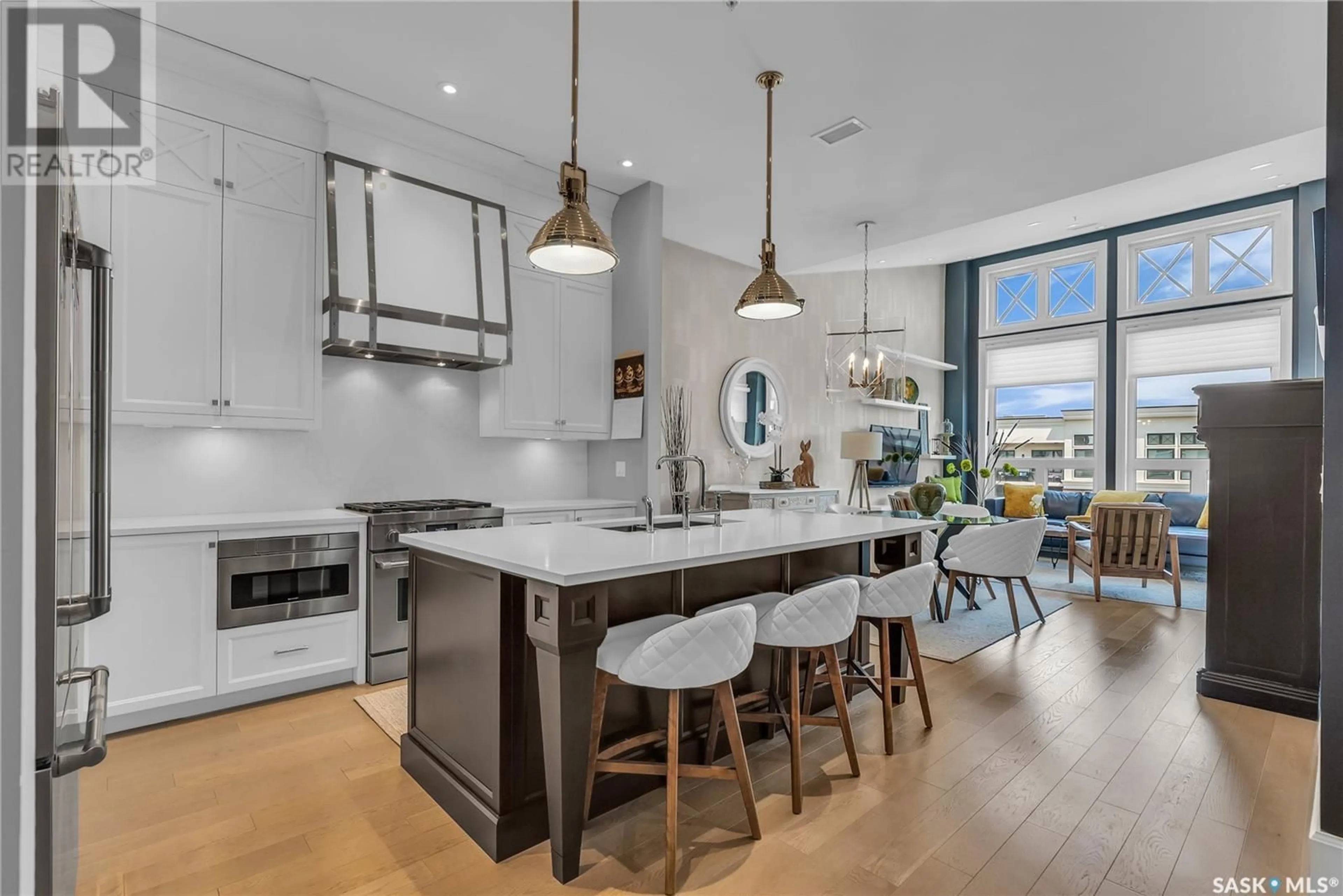 Open concept kitchen, ceramic/tile floor for 308 - 404 CARTWRIGHT STREET, Saskatoon Saskatchewan S7T0W6