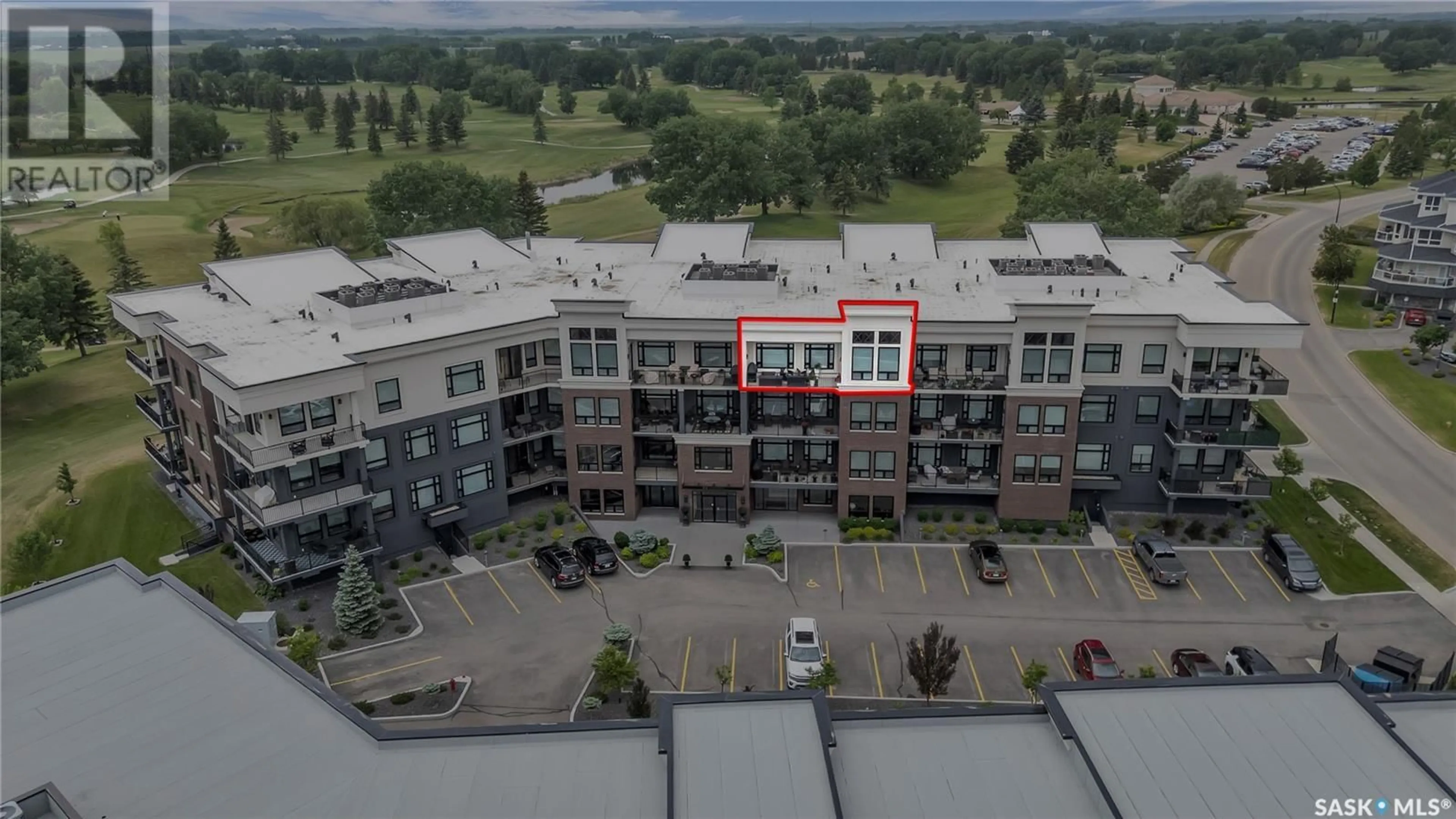 A pic from outside/outdoor area/front of a property/back of a property/a pic from drone, building for 308 - 404 CARTWRIGHT STREET, Saskatoon Saskatchewan S7T0W6
