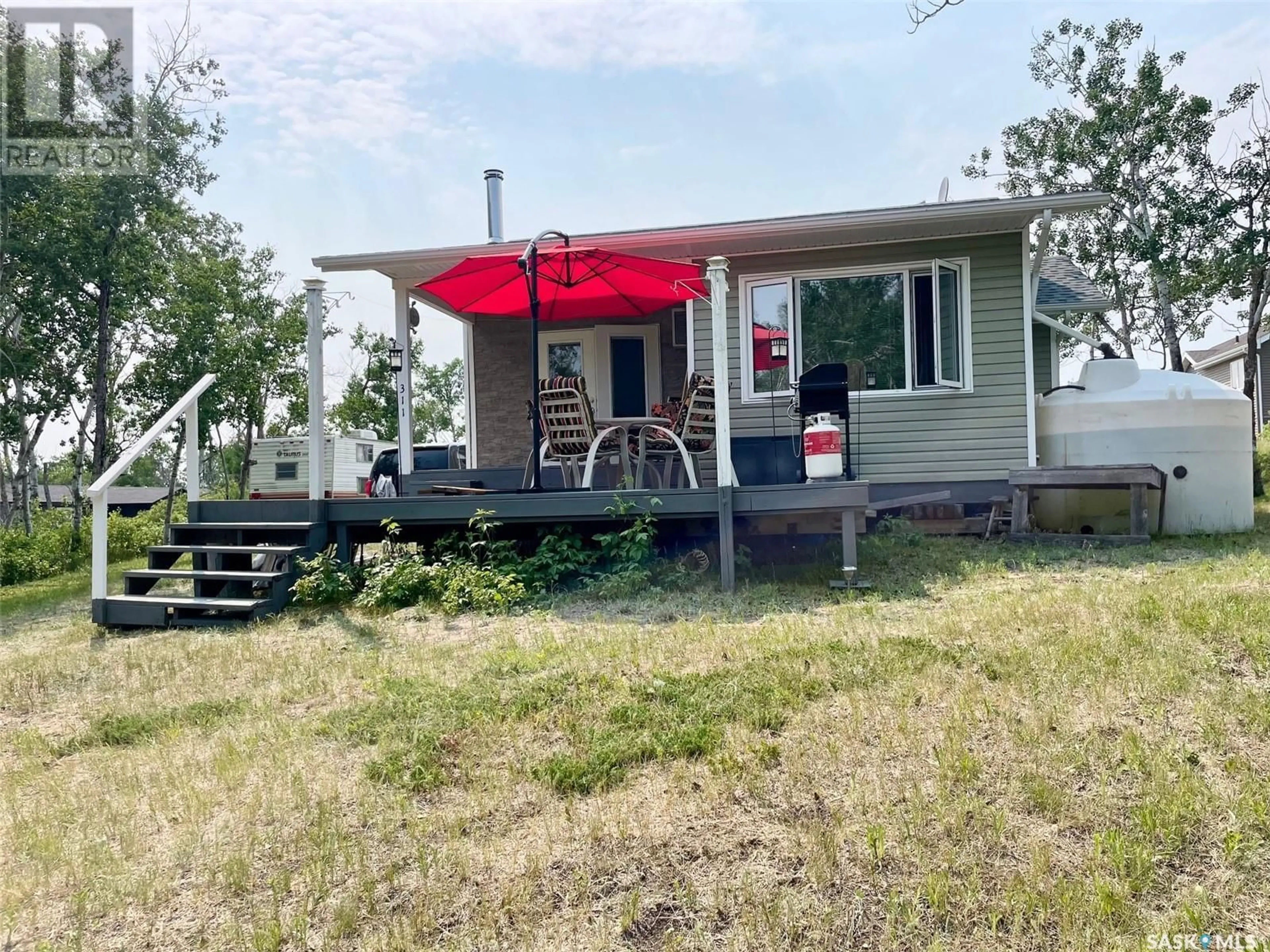 A pic from outside/outdoor area/front of a property/back of a property/a pic from drone, street for SANDY CRESCENT, Good Spirit Lake Saskatchewan S0A0L0