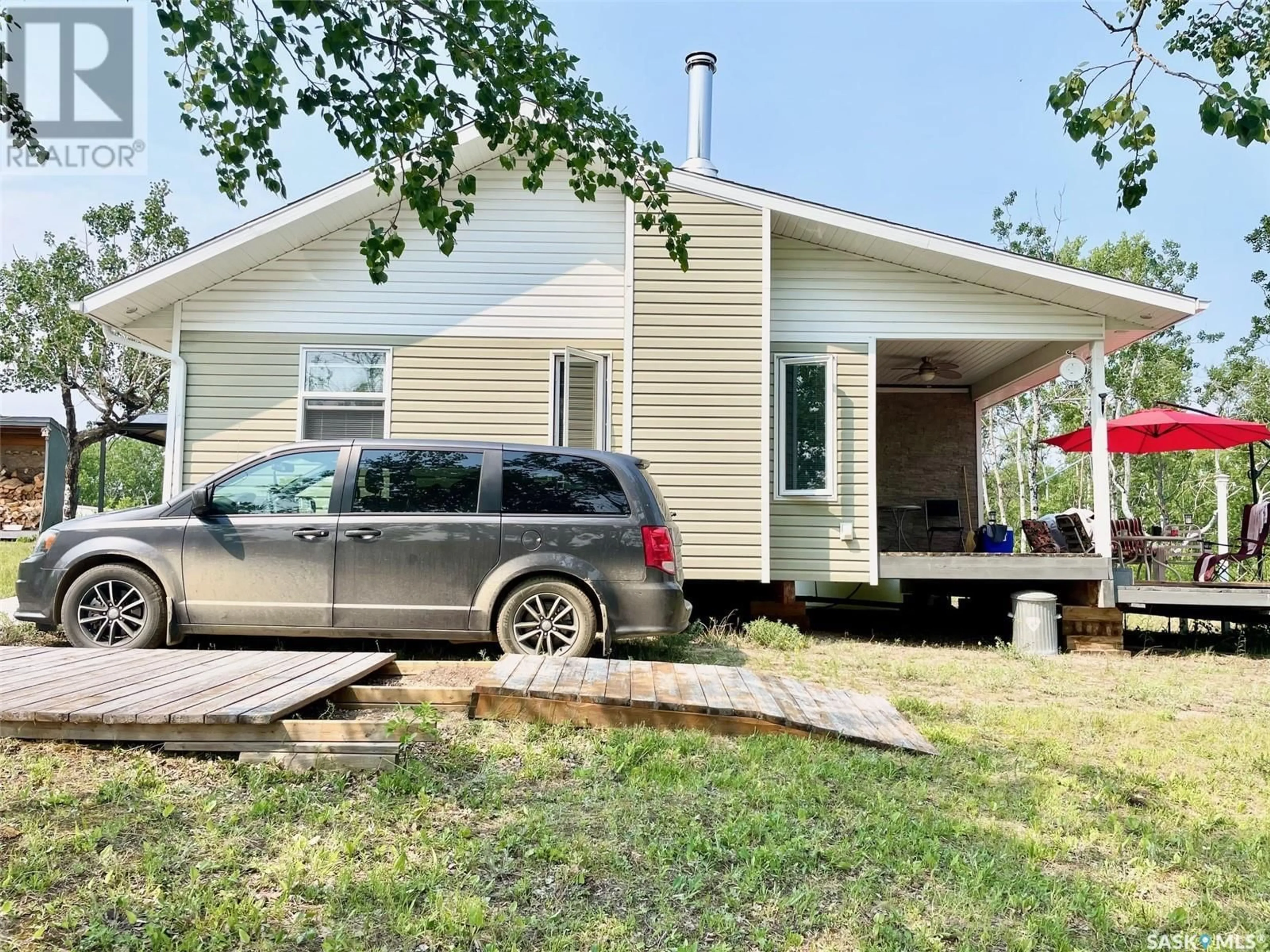 Home with vinyl exterior material, street for SANDY CRESCENT, Good Spirit Lake Saskatchewan S0A0L0