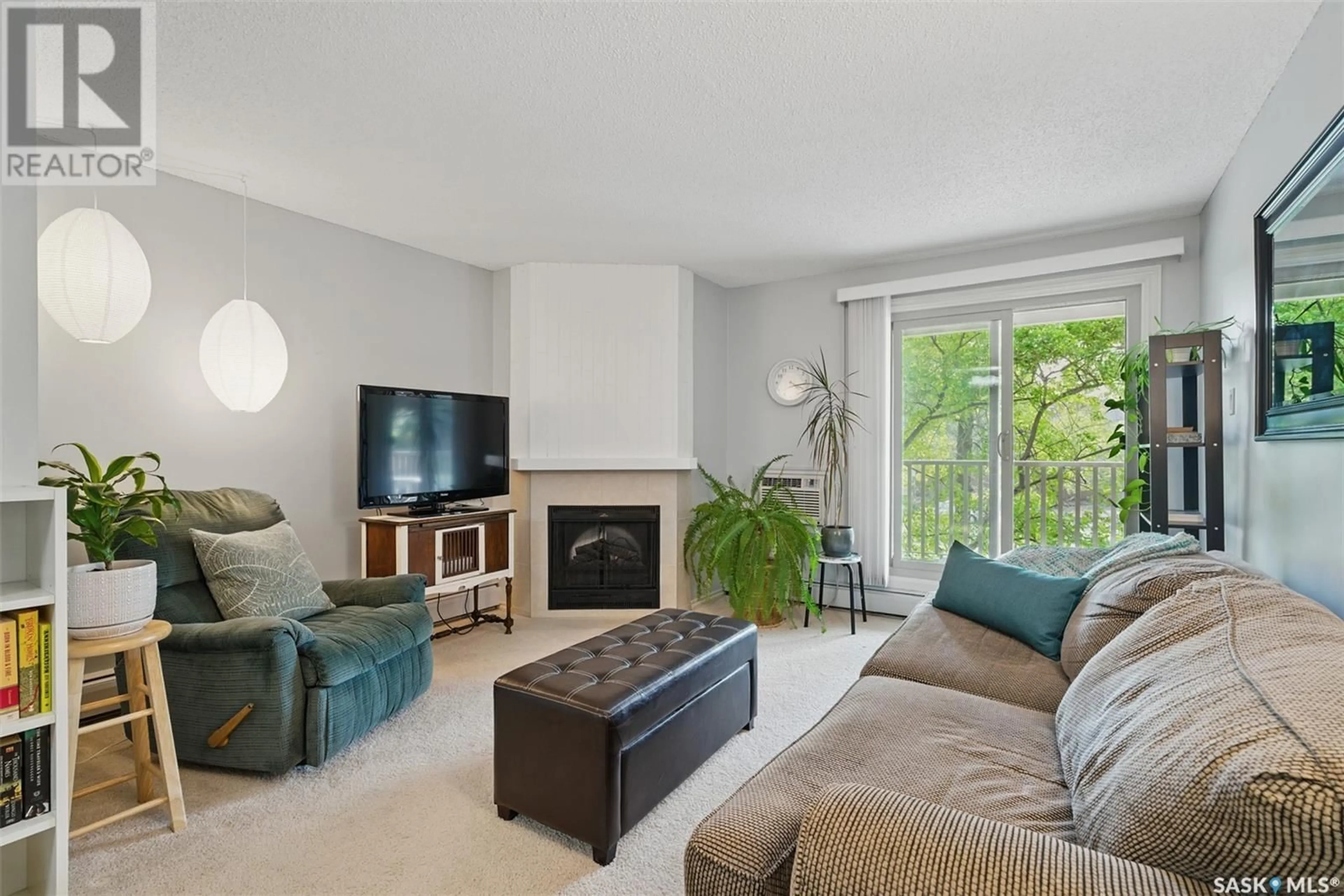 Living room with furniture, unknown for 206H - 1121 MCKERCHER DRIVE, Saskatoon Saskatchewan S7H5B8