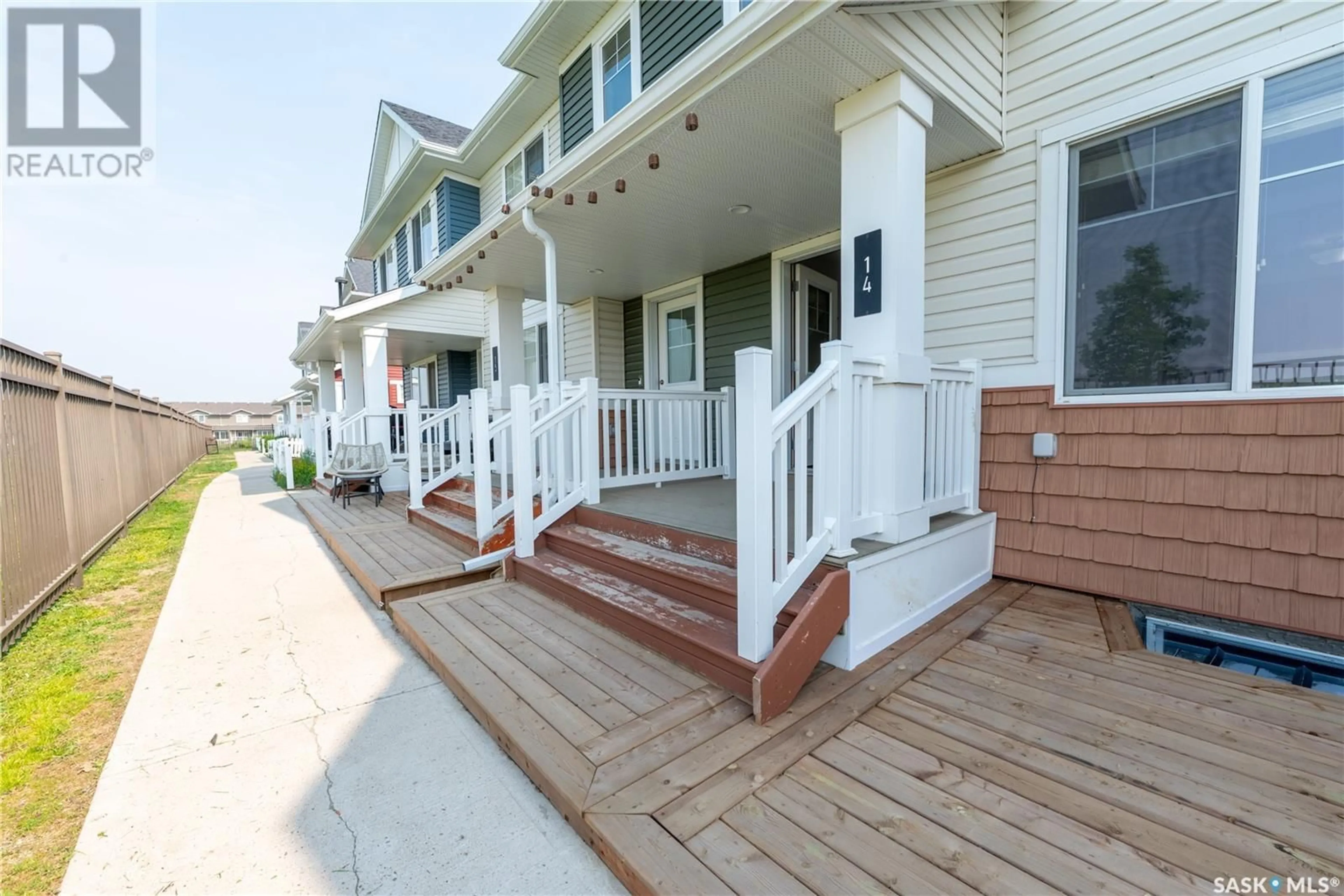 Home with vinyl exterior material, street for 14 5290 AERODROME ROAD, Regina Saskatchewan S4W0H7