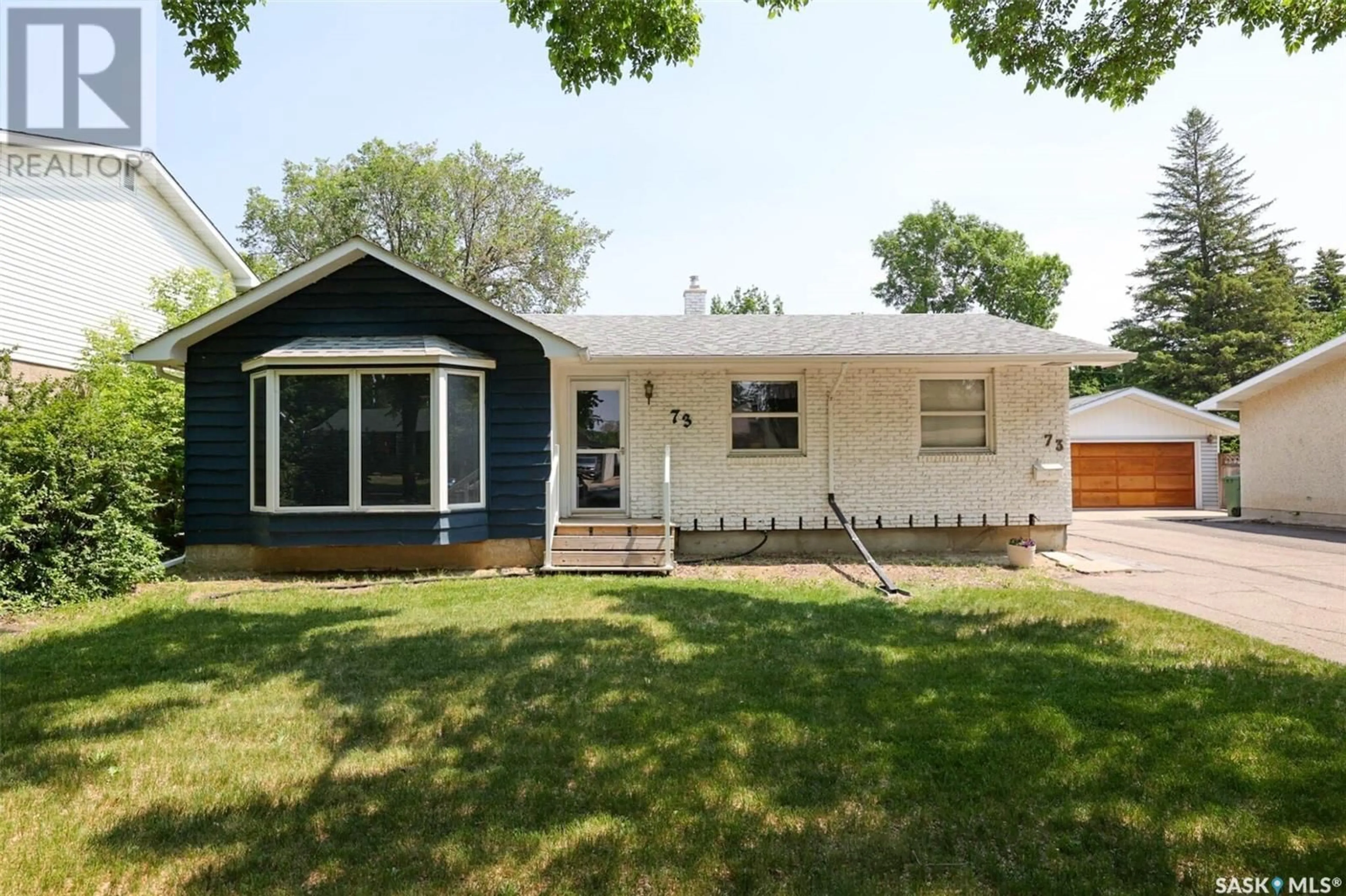 Home with vinyl exterior material, street for 73 BELL STREET, Regina Saskatchewan S4S5V2