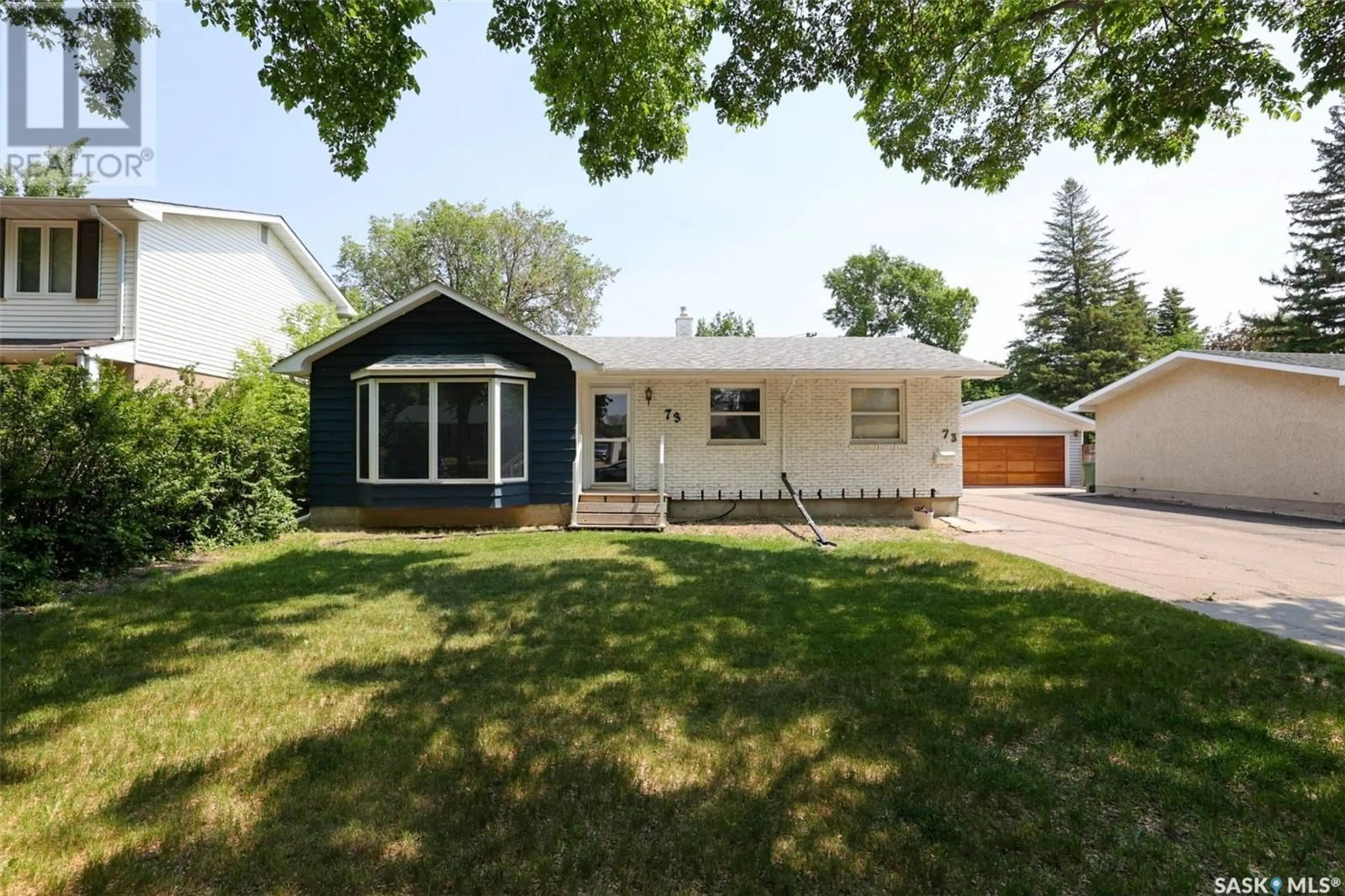 Home with vinyl exterior material, street for 73 BELL STREET, Regina Saskatchewan S4S5V2