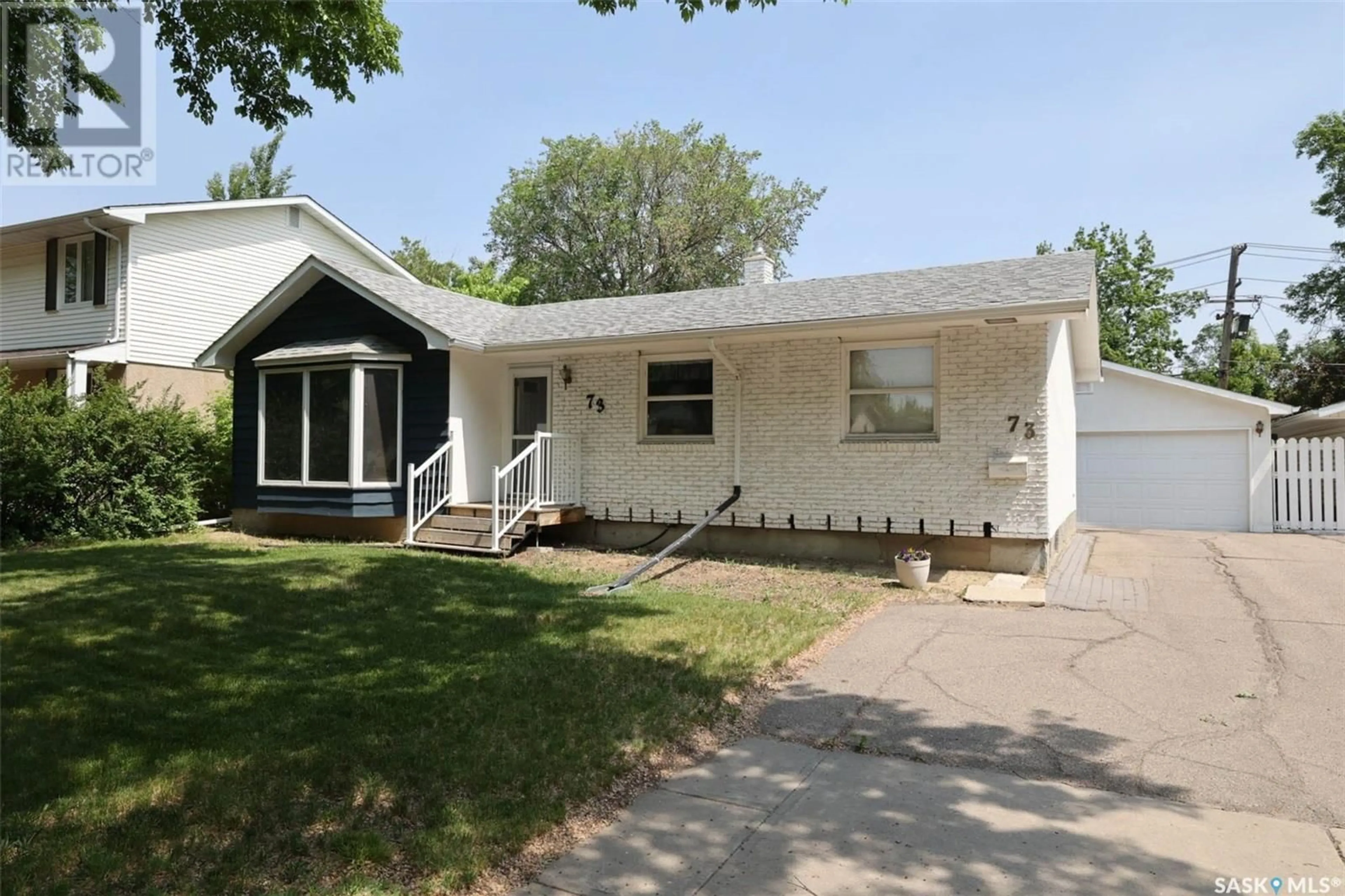 Home with vinyl exterior material, street for 73 BELL STREET, Regina Saskatchewan S4S5V2