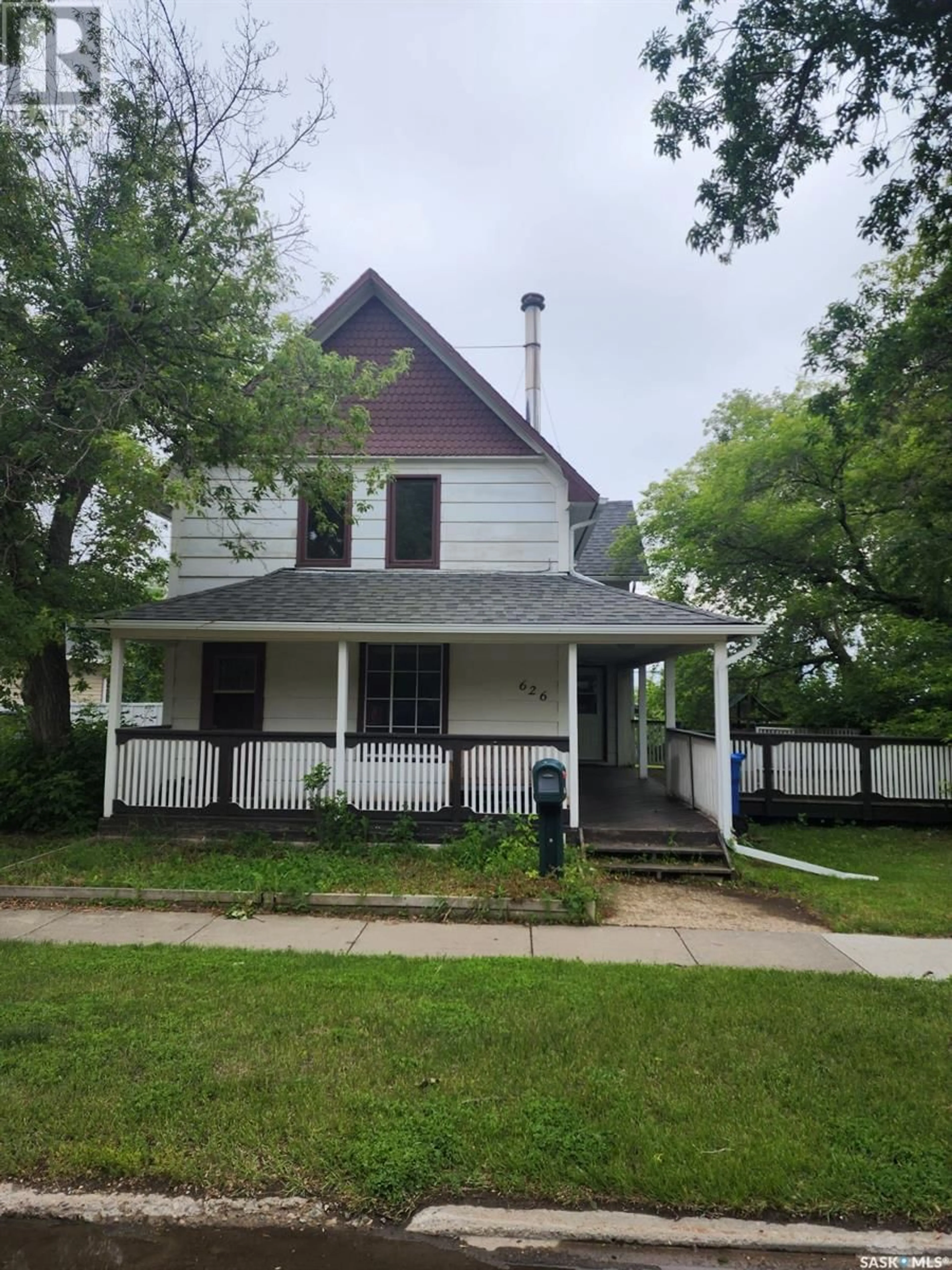 Home with vinyl exterior material, street for 626 2ND STREET, Estevan Saskatchewan S4A0K9