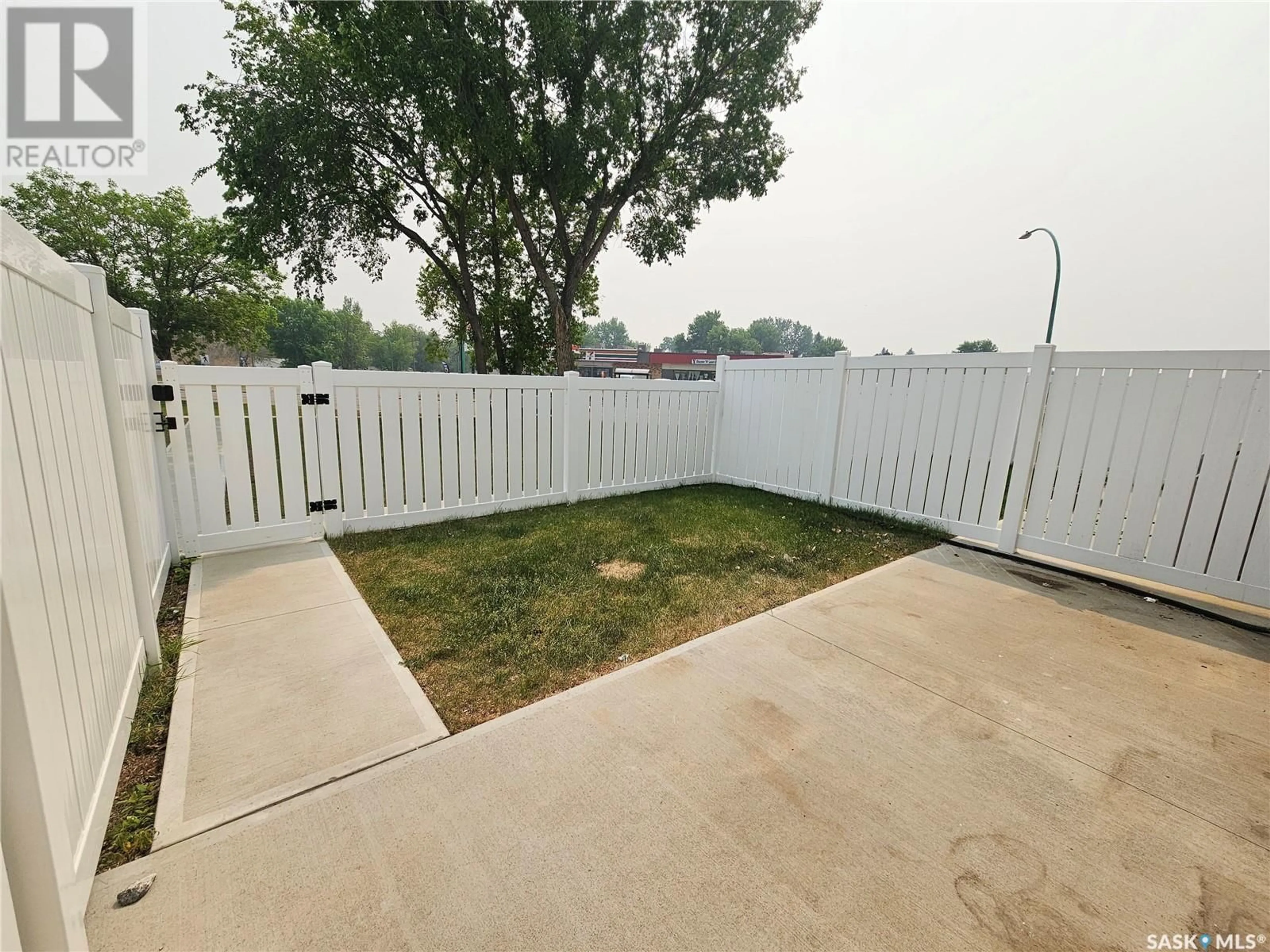 Patio, street for 13 - 1292 GORDON ROAD, Moose Jaw Saskatchewan S6H7V9