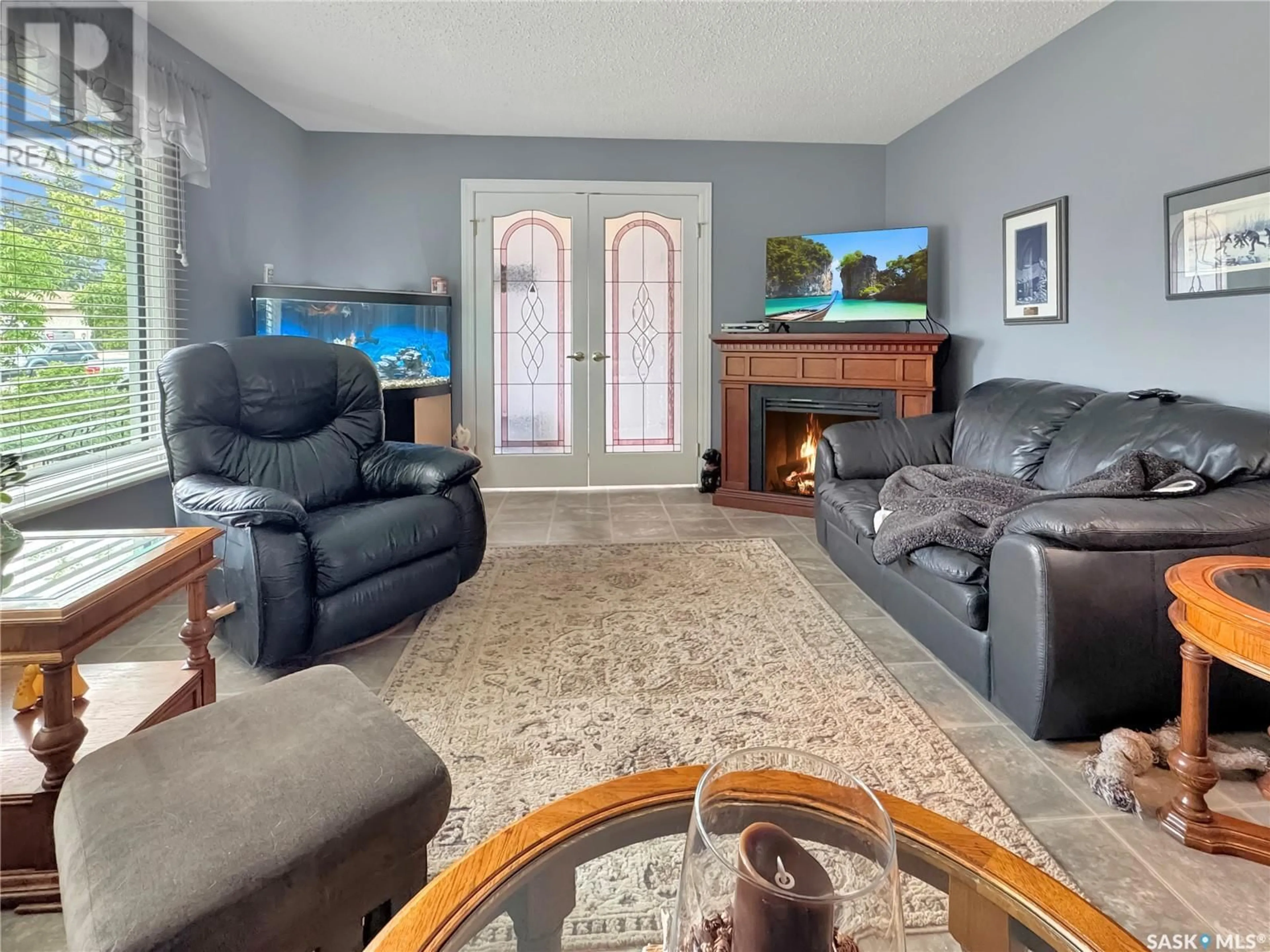 Living room with furniture, unknown for 2027 FOLEY DRIVE, North Battleford Saskatchewan S9A3H1