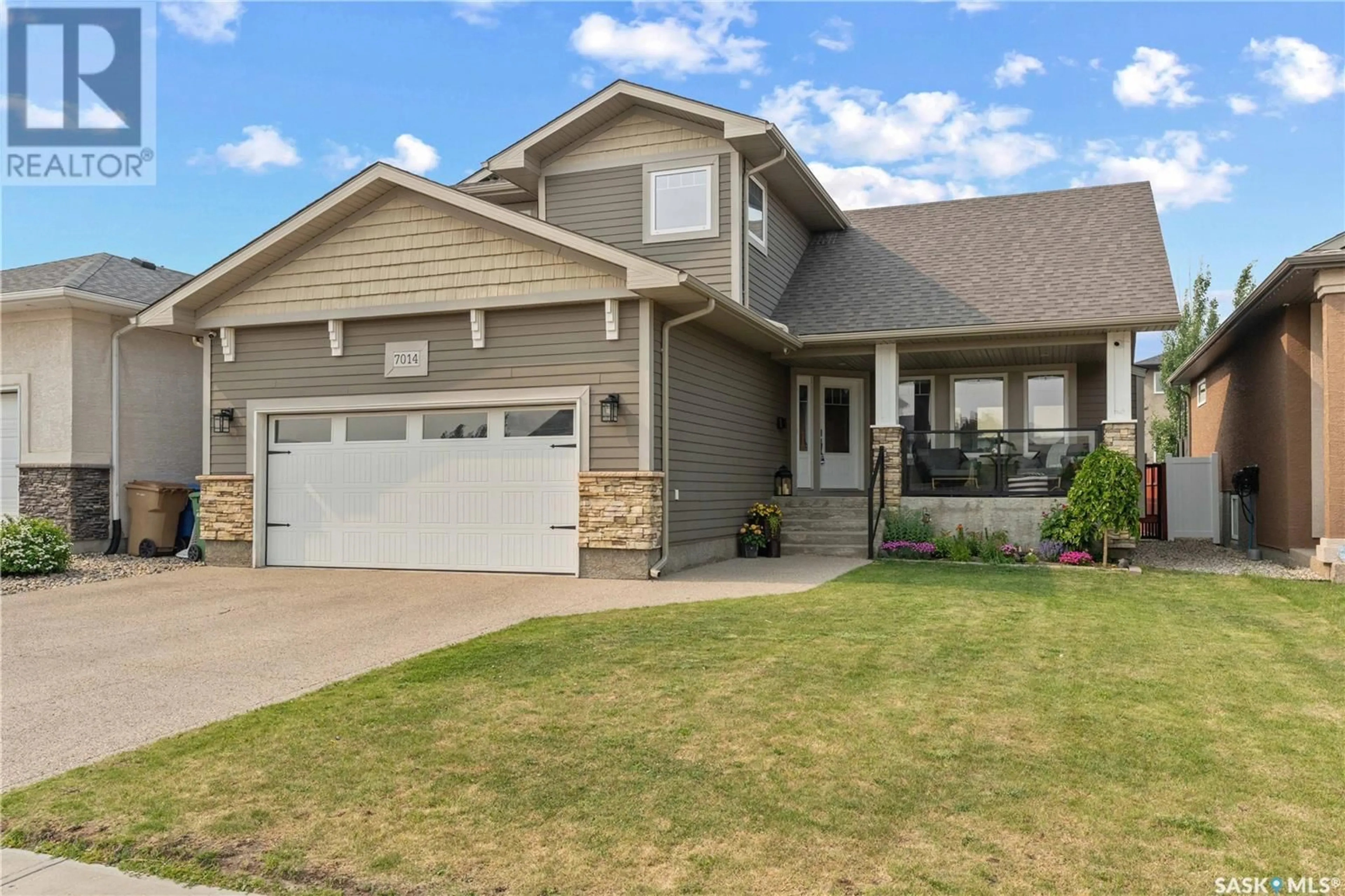 Home with vinyl exterior material, street for 7014 MAPLE RIDGE DRIVE, Regina Saskatchewan S4X0E9