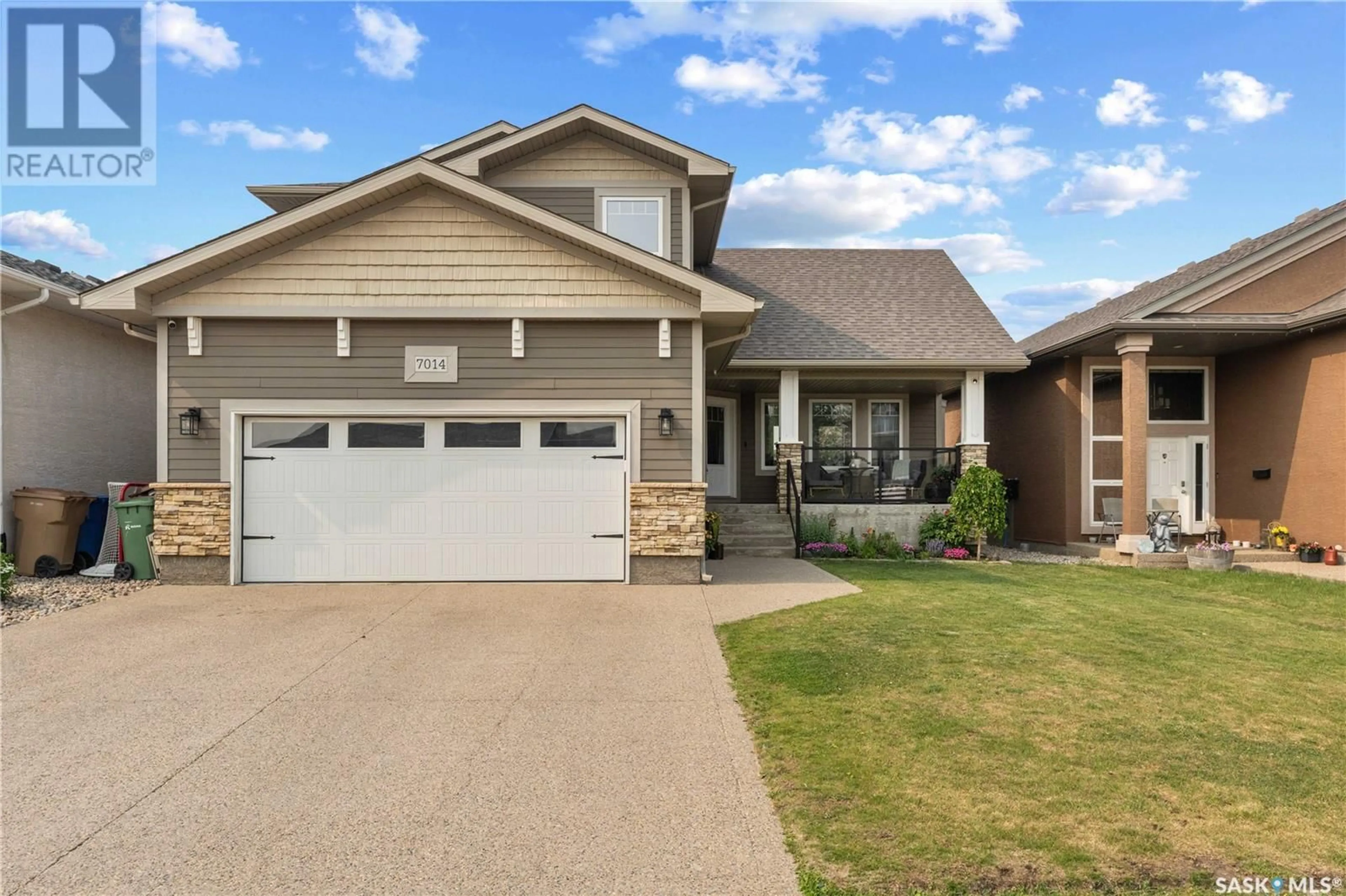 Home with vinyl exterior material, street for 7014 MAPLE RIDGE DRIVE, Regina Saskatchewan S4X0E9