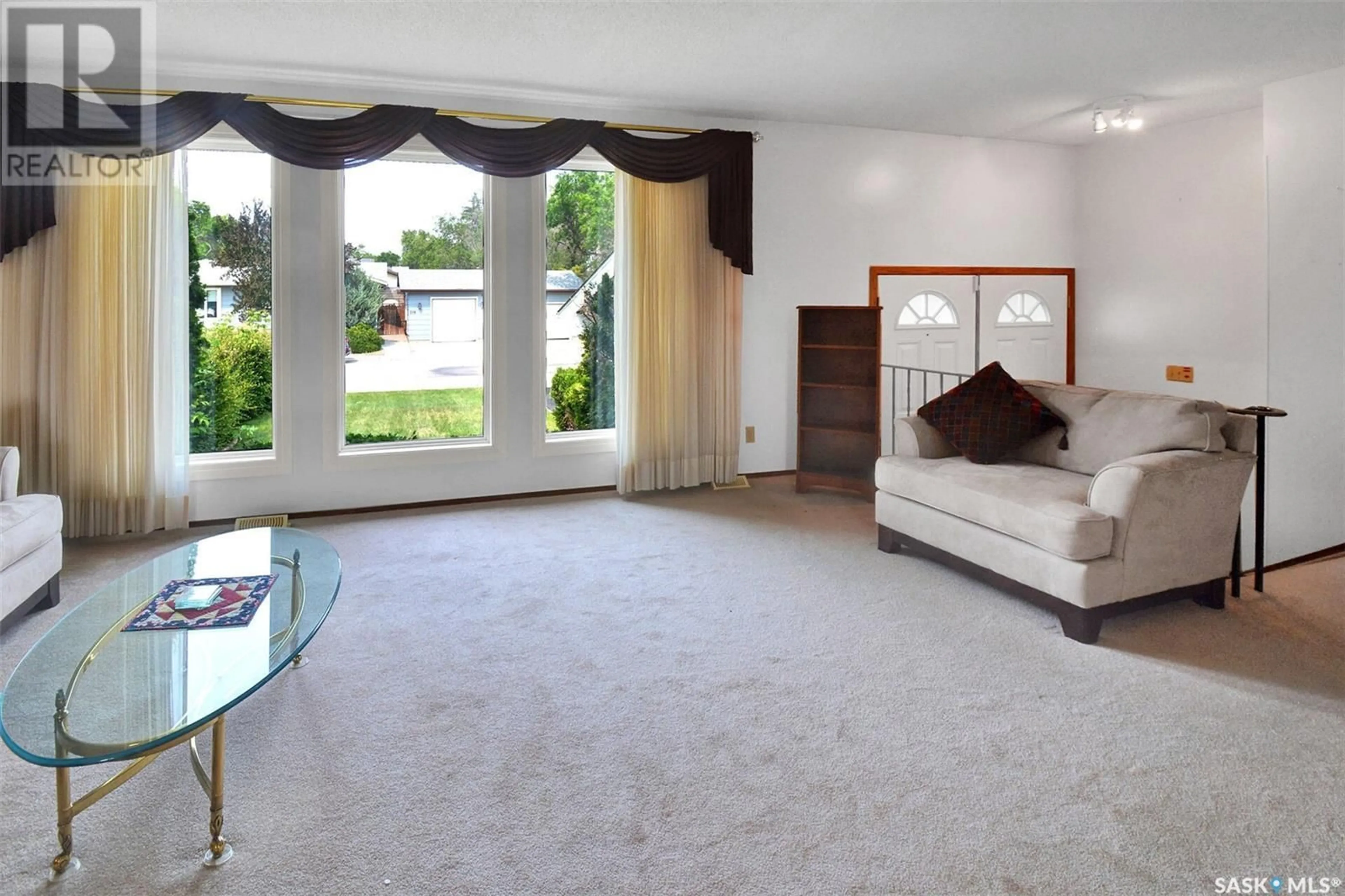 Living room with furniture, carpet floor for 359 COPPERMINE CRESCENT, Saskatoon Saskatchewan S7K4L5