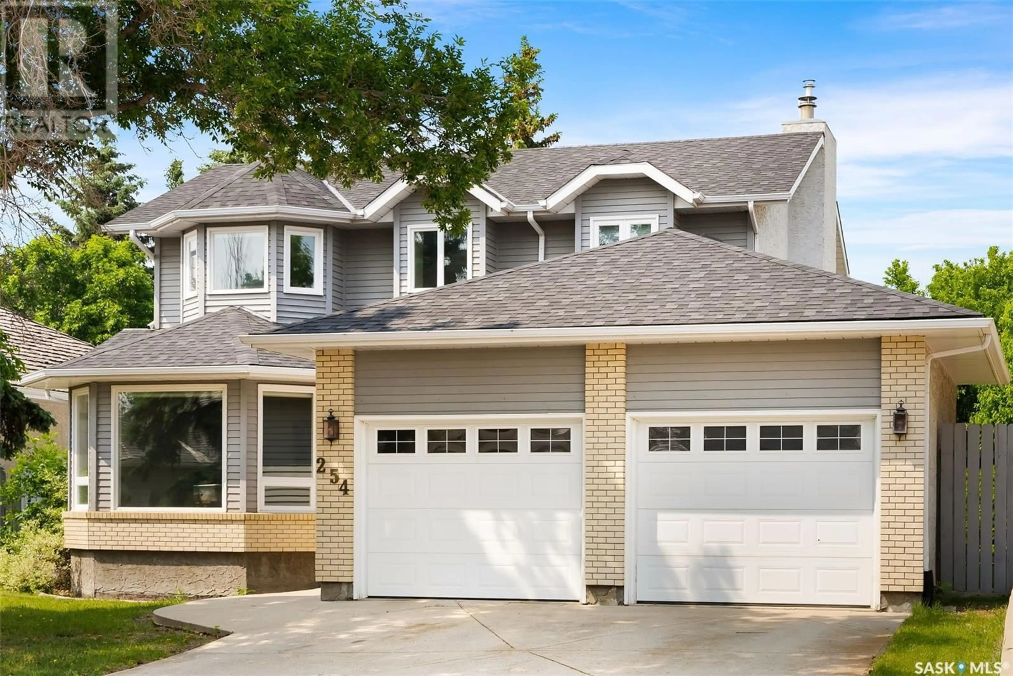 Home with vinyl exterior material, street for 254 ROGERS ROAD, Regina Saskatchewan S4S7C4