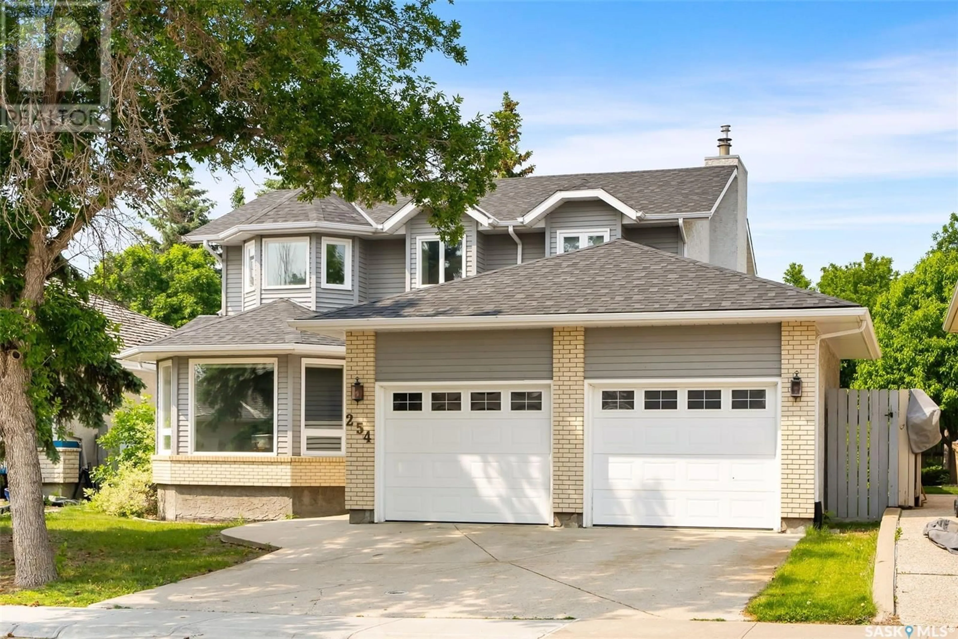 Home with vinyl exterior material, street for 254 ROGERS ROAD, Regina Saskatchewan S4S7C4