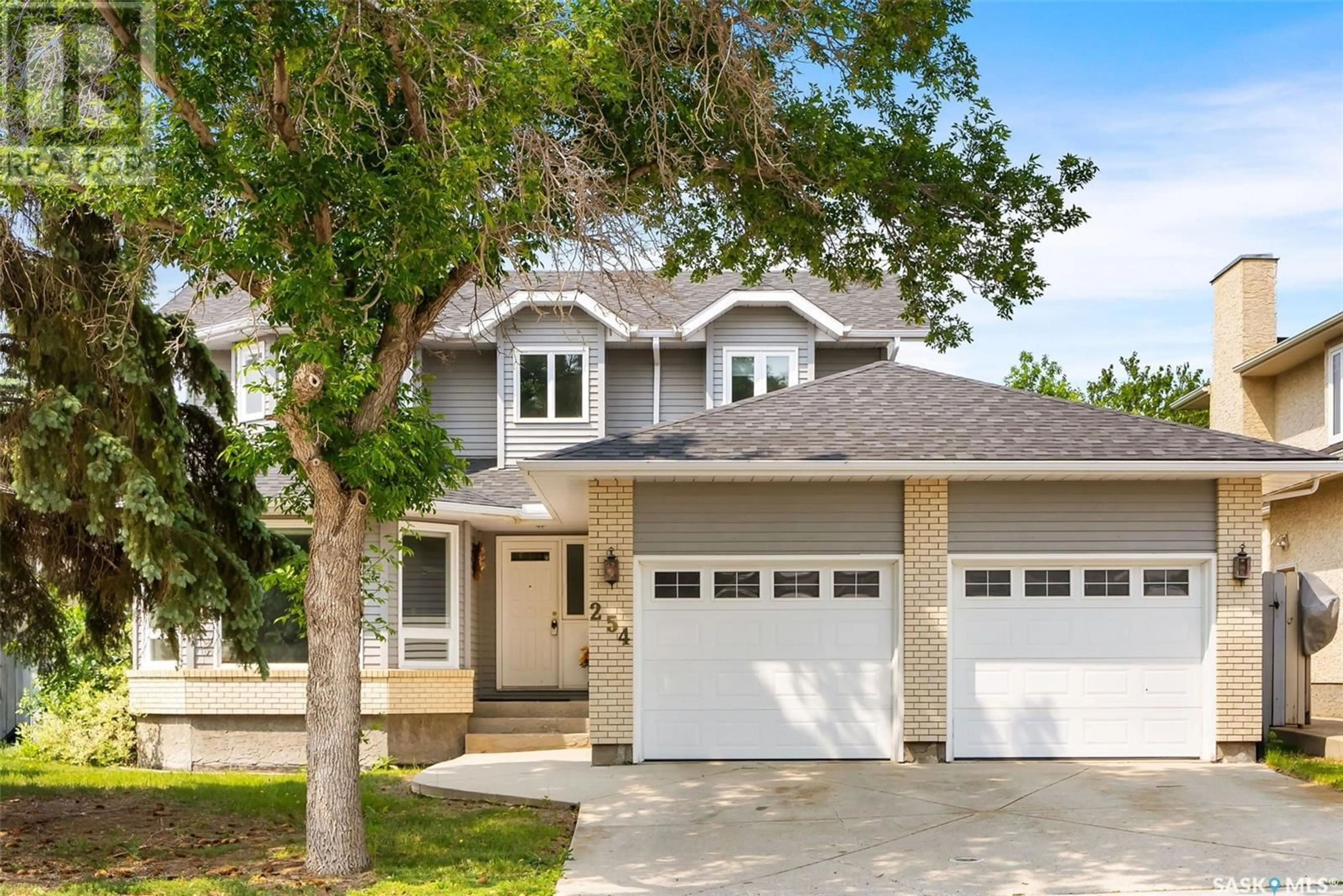 Home with vinyl exterior material, street for 254 ROGERS ROAD, Regina Saskatchewan S4S7C4
