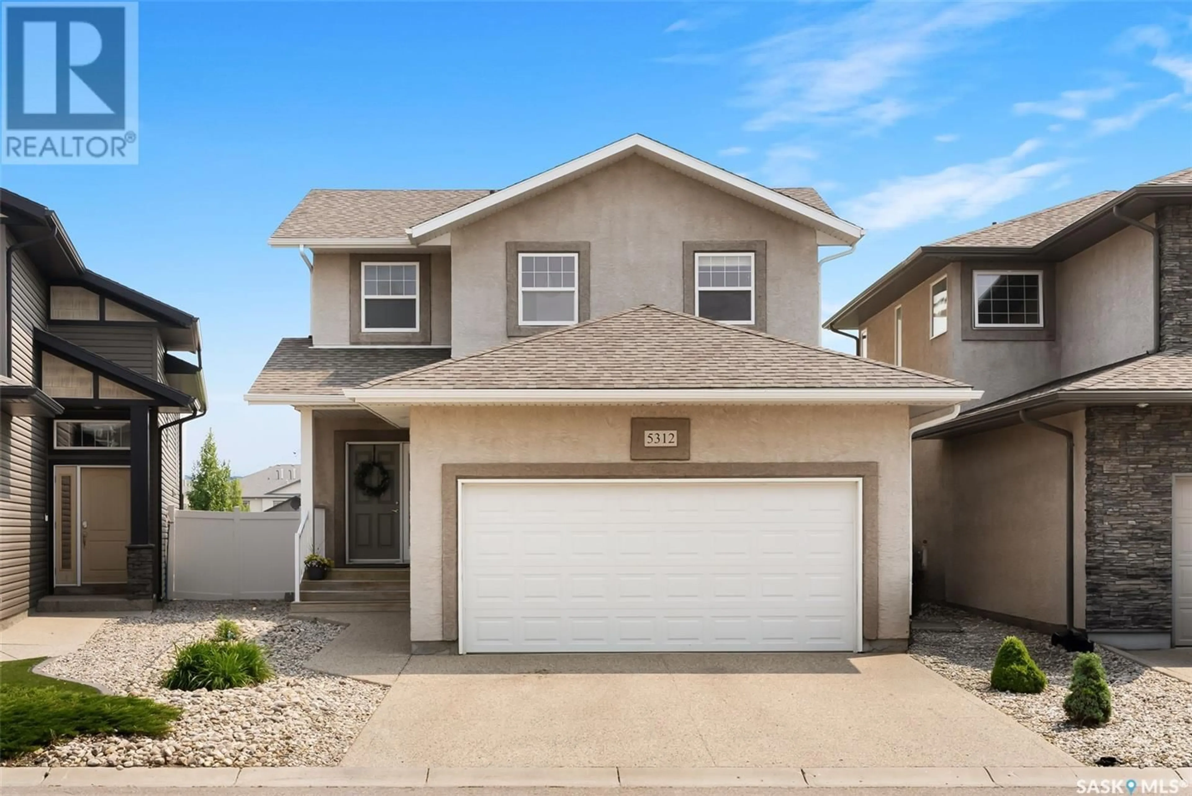 Home with vinyl exterior material, street for 5312 AERIAL CRESCENT, Regina Saskatchewan S4W0C9