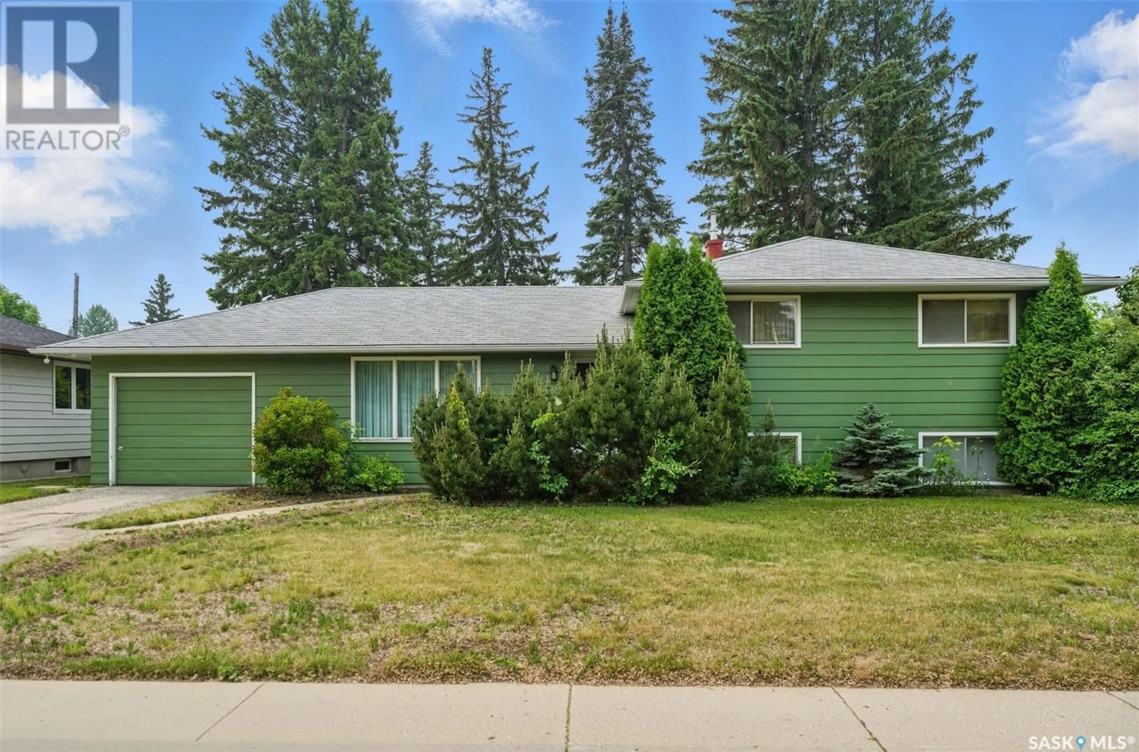 Home with vinyl exterior material, street for 1304 MCLORG STREET, Saskatoon Saskatchewan S7J0N4