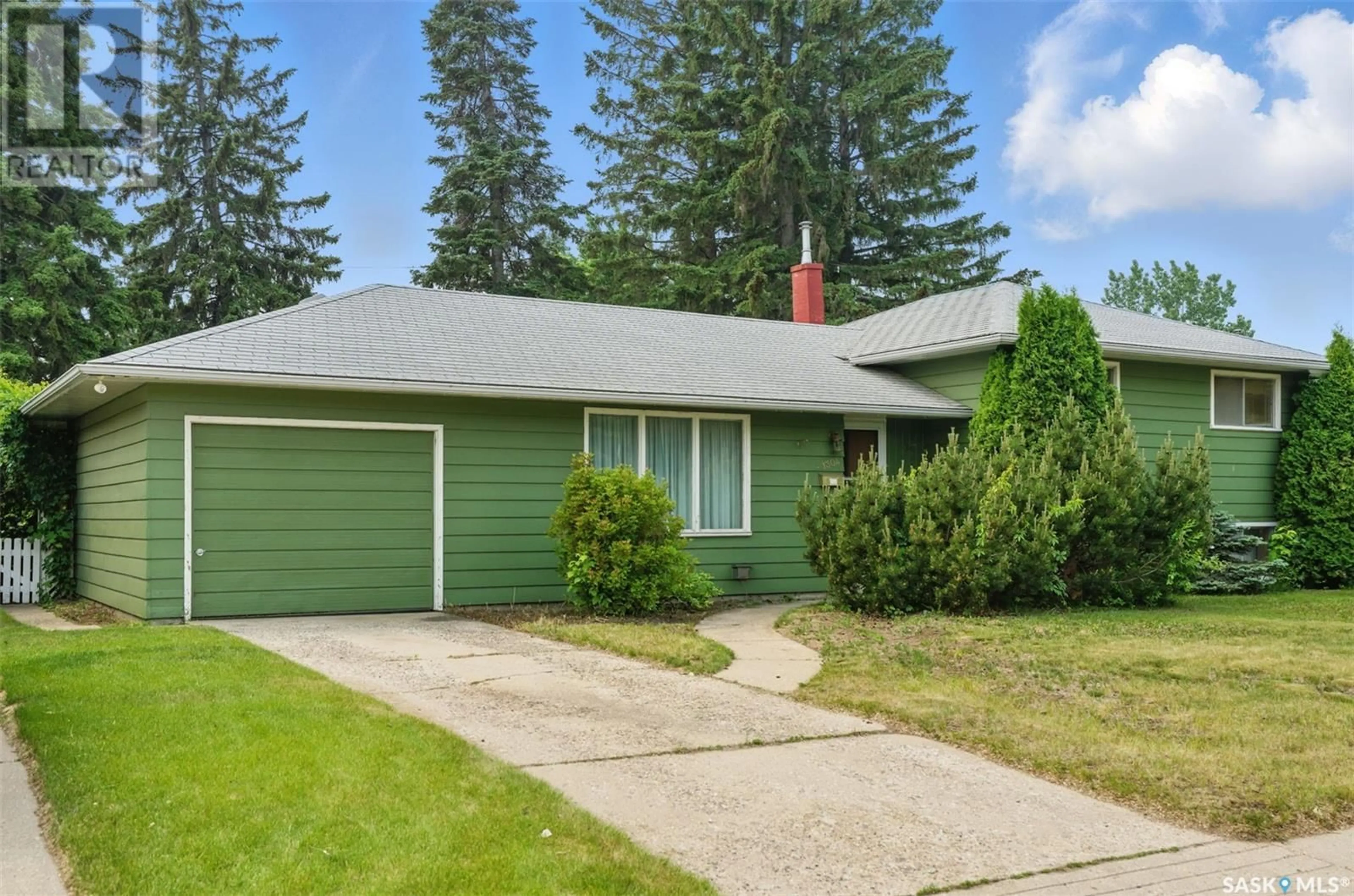 Home with vinyl exterior material, street for 1304 MCLORG STREET, Saskatoon Saskatchewan S7J0N4