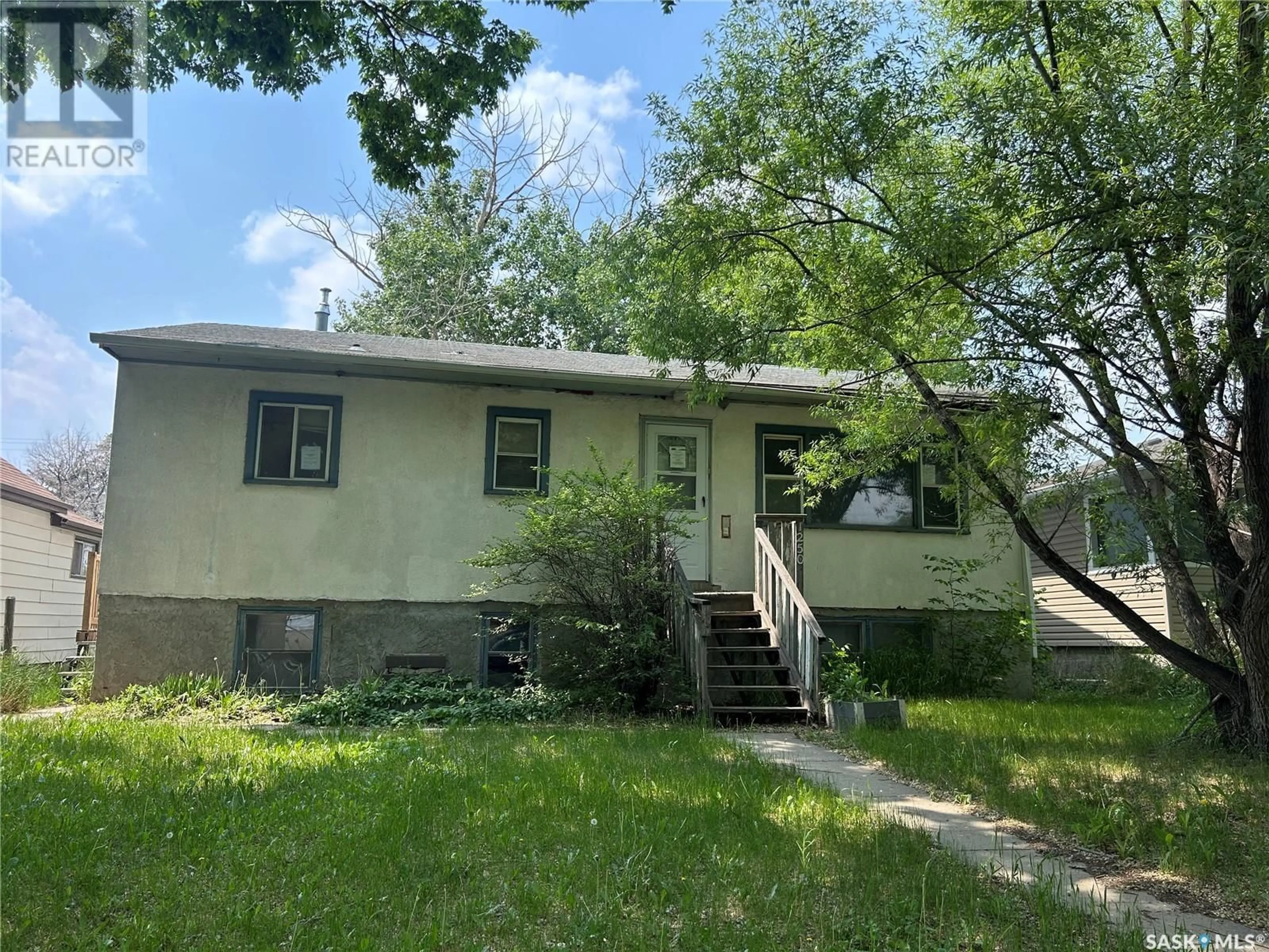 Home with vinyl exterior material, street for 1250 LINDSAY STREET, Regina Saskatchewan S4N3B3