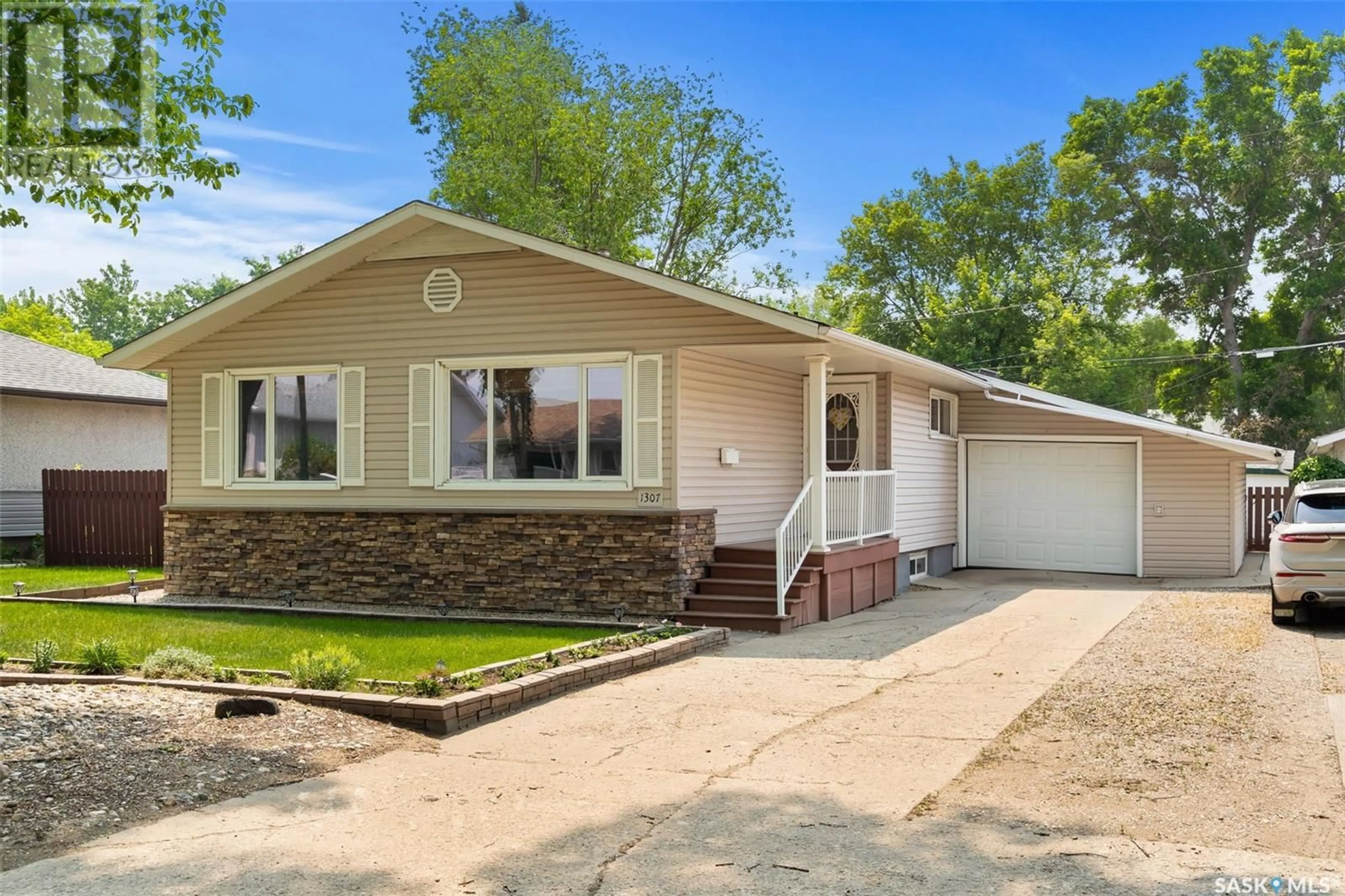 Home with vinyl exterior material, street for 1307 DOVER AVENUE, Regina Saskatchewan S4R0L6