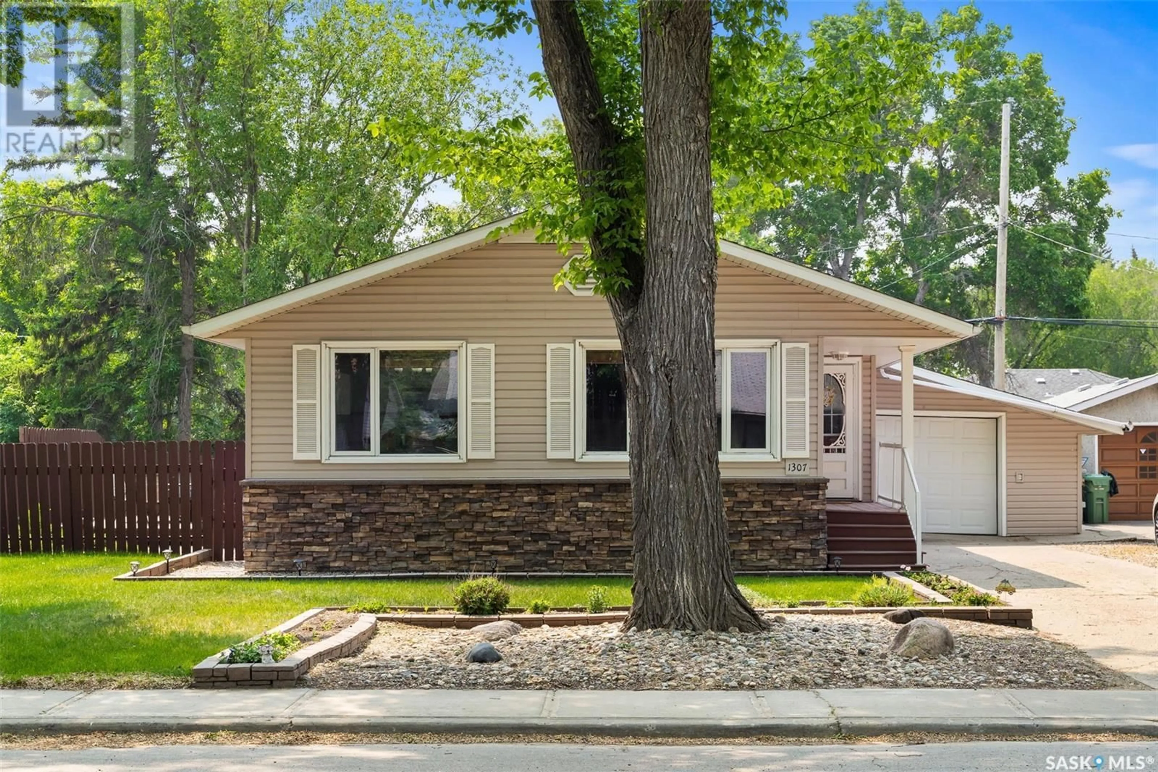Home with vinyl exterior material, street for 1307 DOVER AVENUE, Regina Saskatchewan S4R0L6