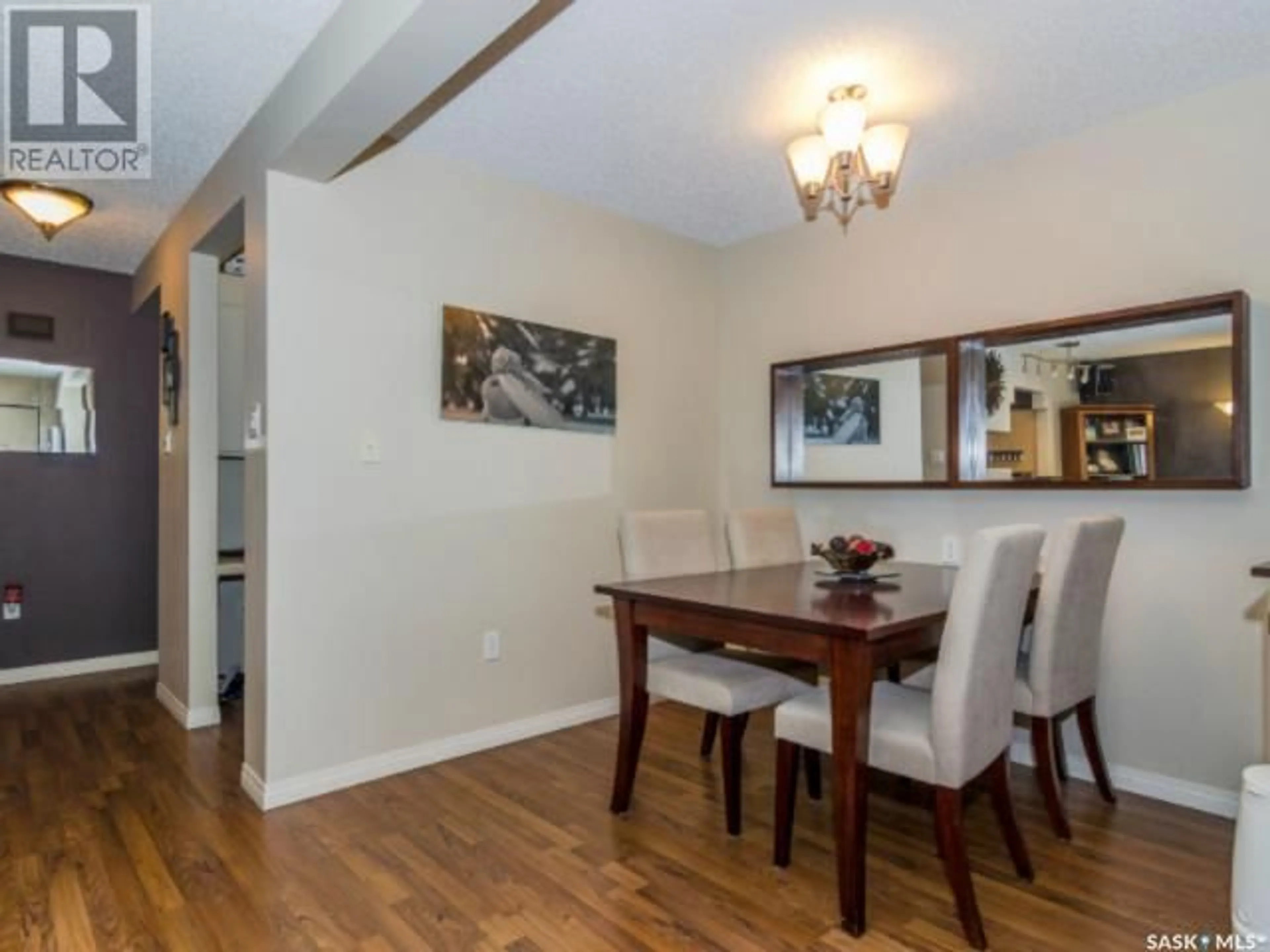 Dining room, wood/laminate floor for 103 - 10 POWE STREET, Saskatoon Saskatchewan S7N1W5