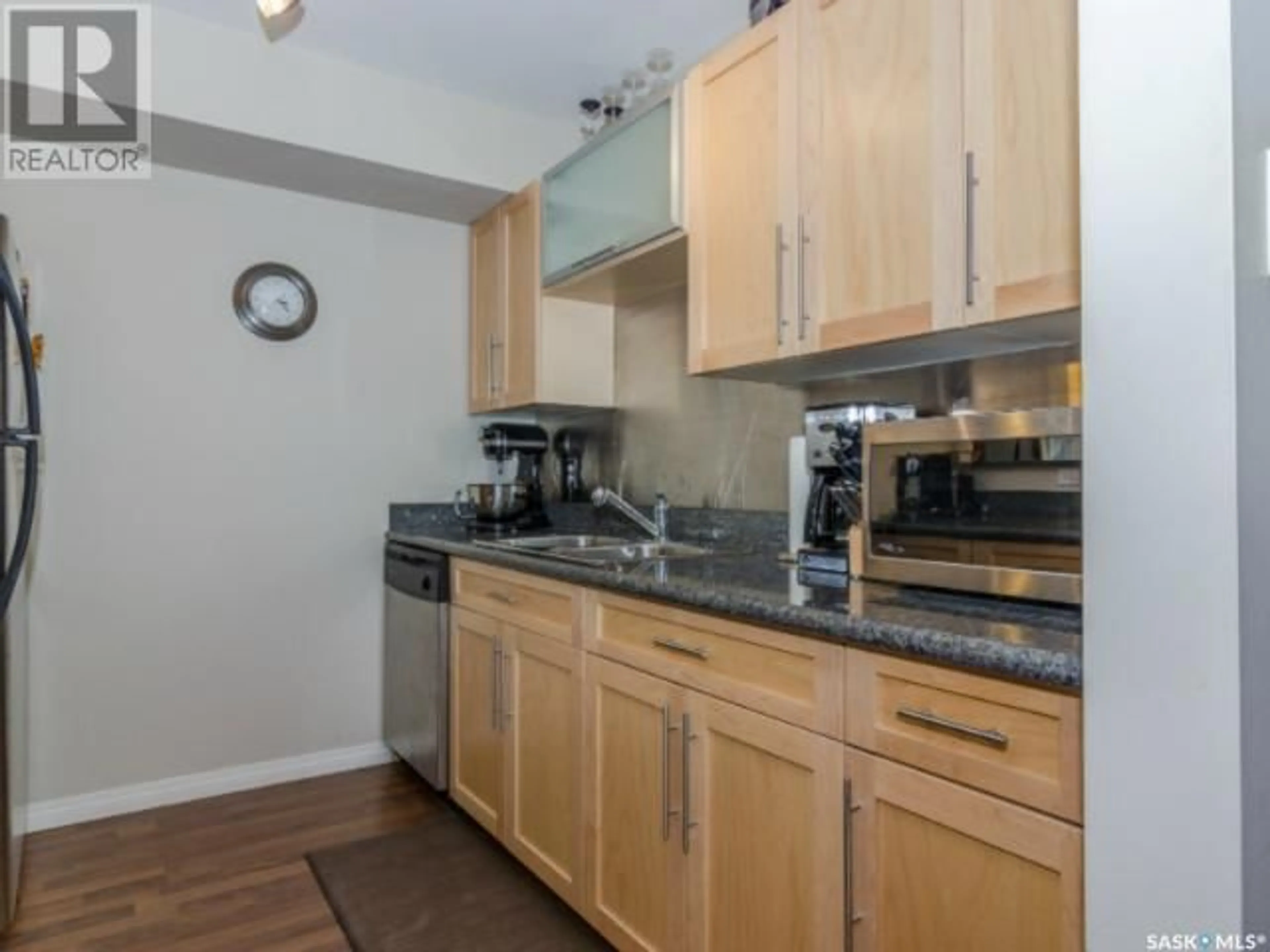 Standard kitchen, wood/laminate floor for 103 - 10 POWE STREET, Saskatoon Saskatchewan S7N1W5