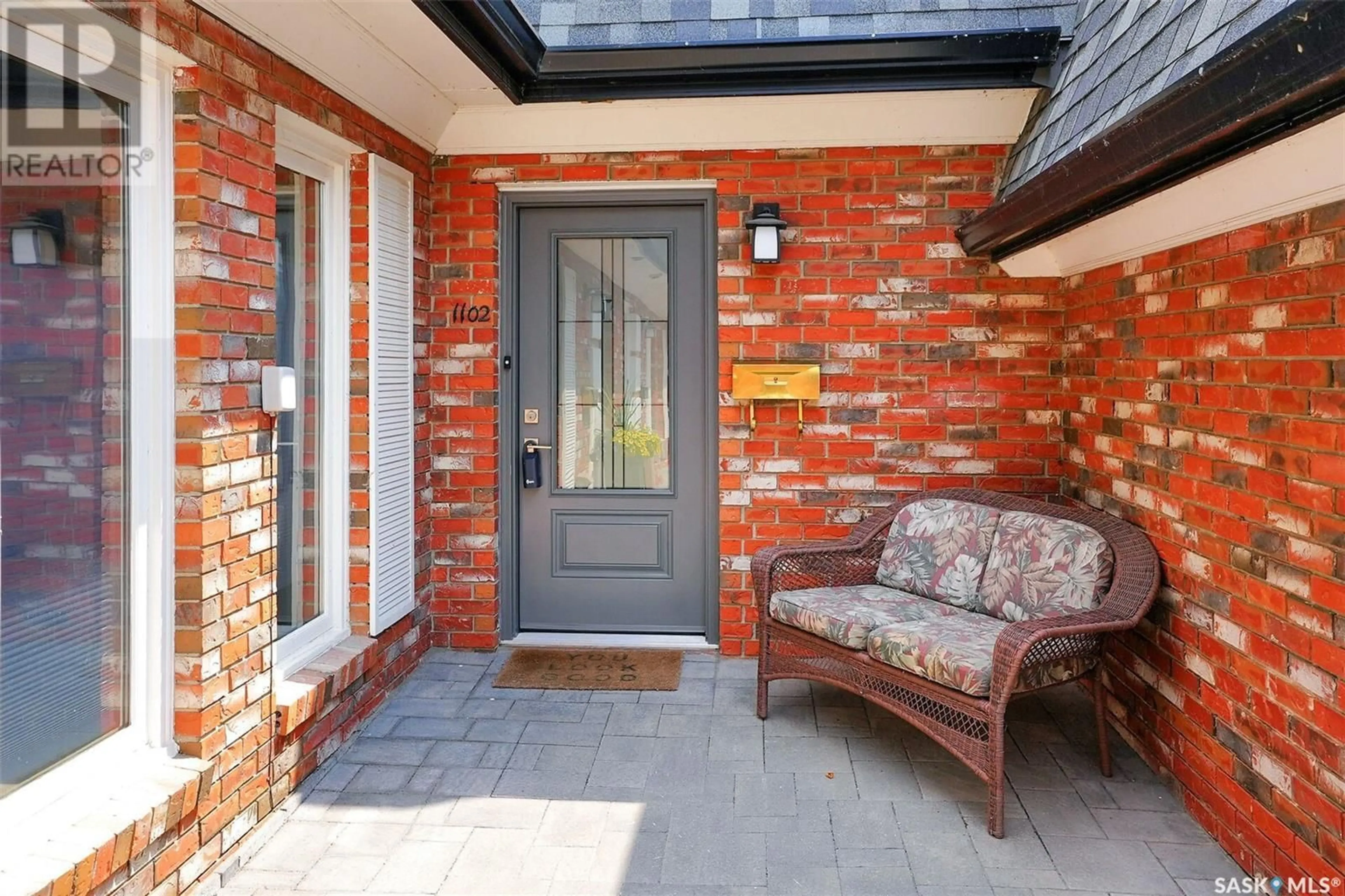 Home with brick exterior material, street for 1102 GRYPHONS WALK, Regina Saskatchewan S4S6X1